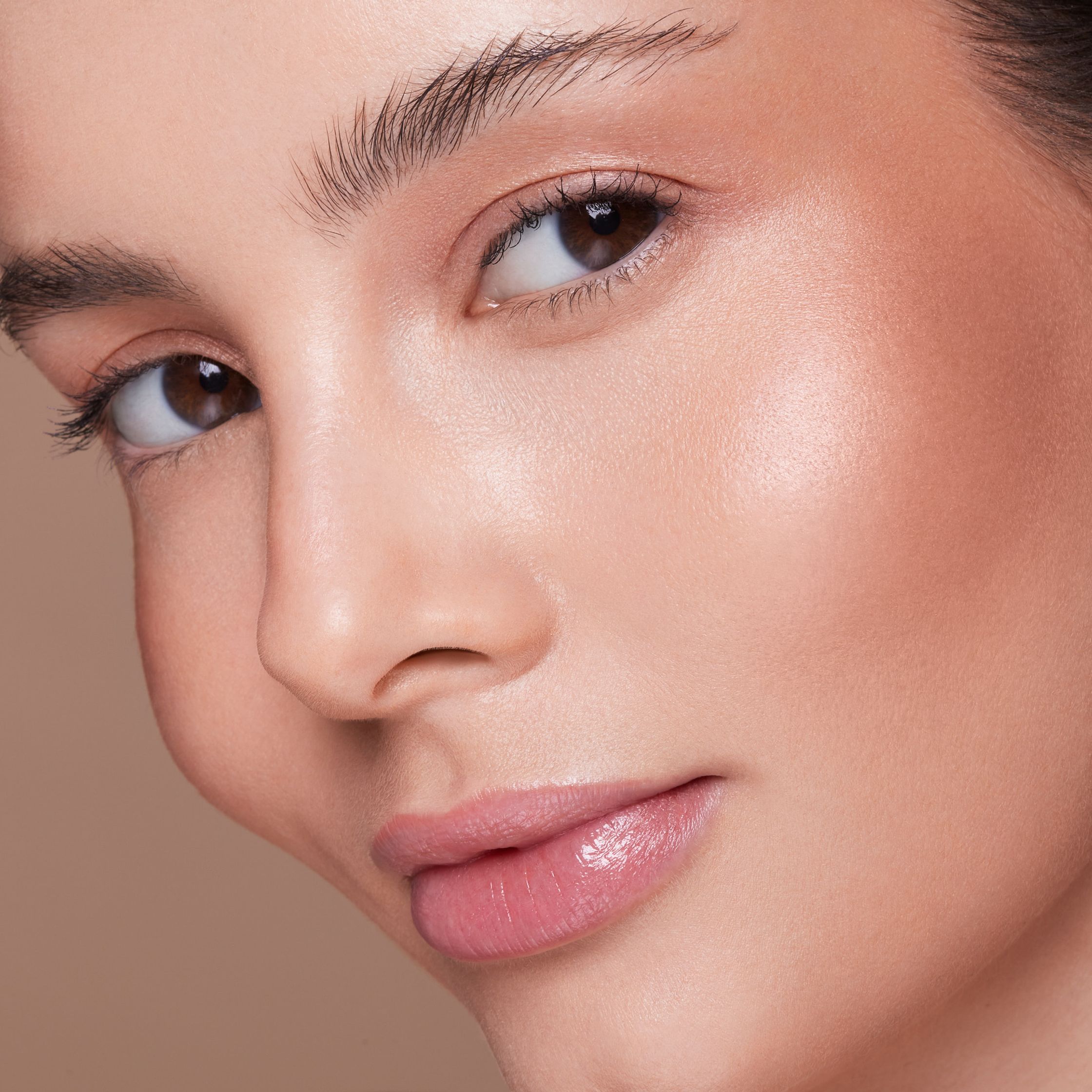 a close up of a woman with makeup on her face