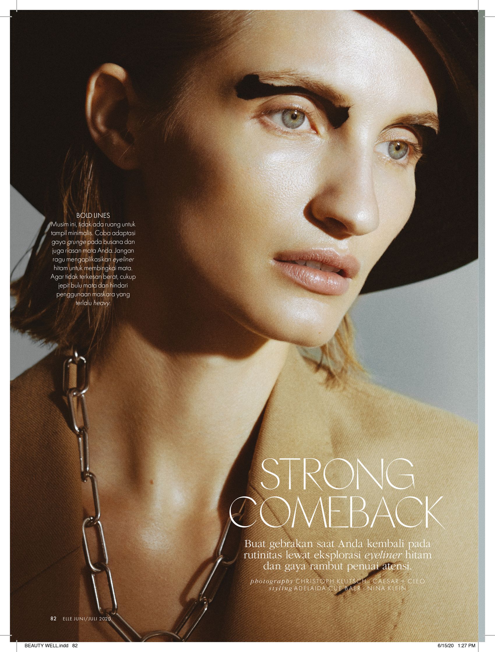 an image of a woman wearing a hat and a necklace