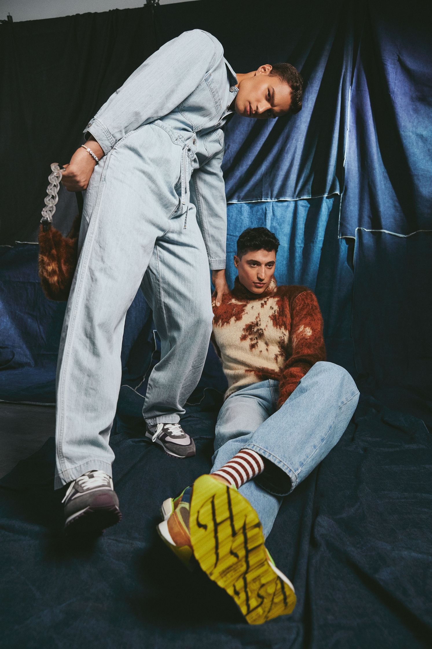 two men posing for a photo shoot