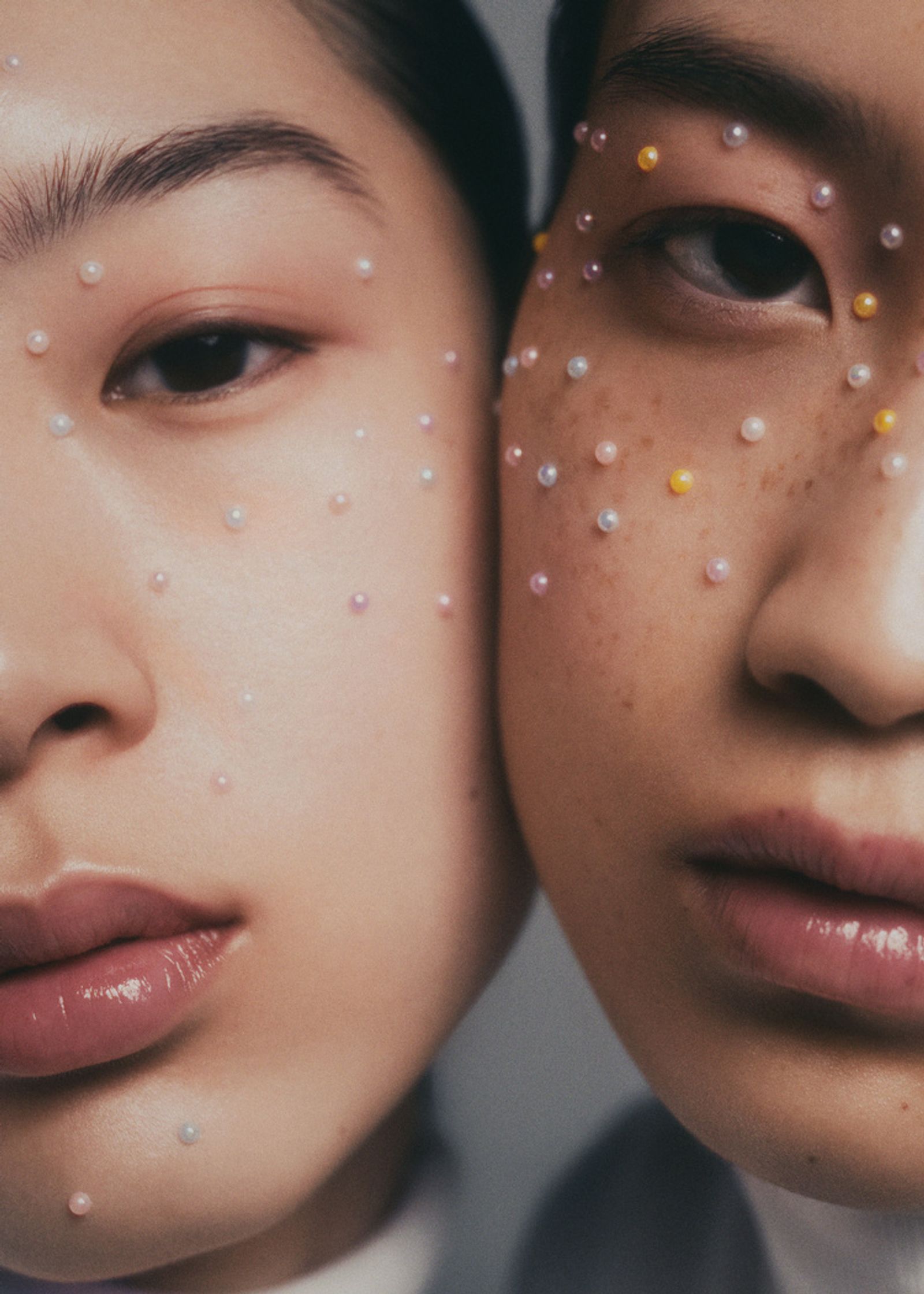 two asian women with stars on their faces