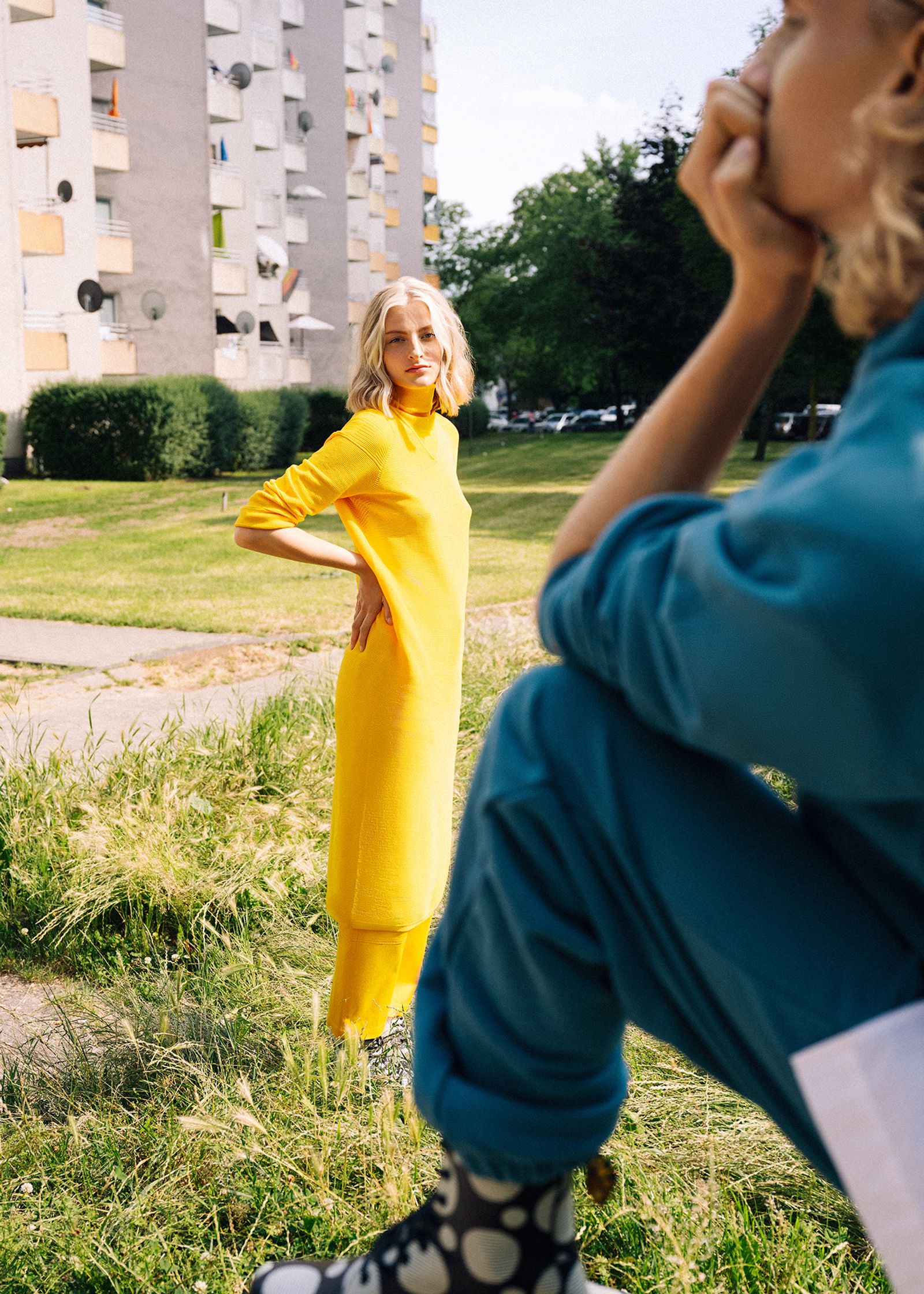 a woman in a yellow dress