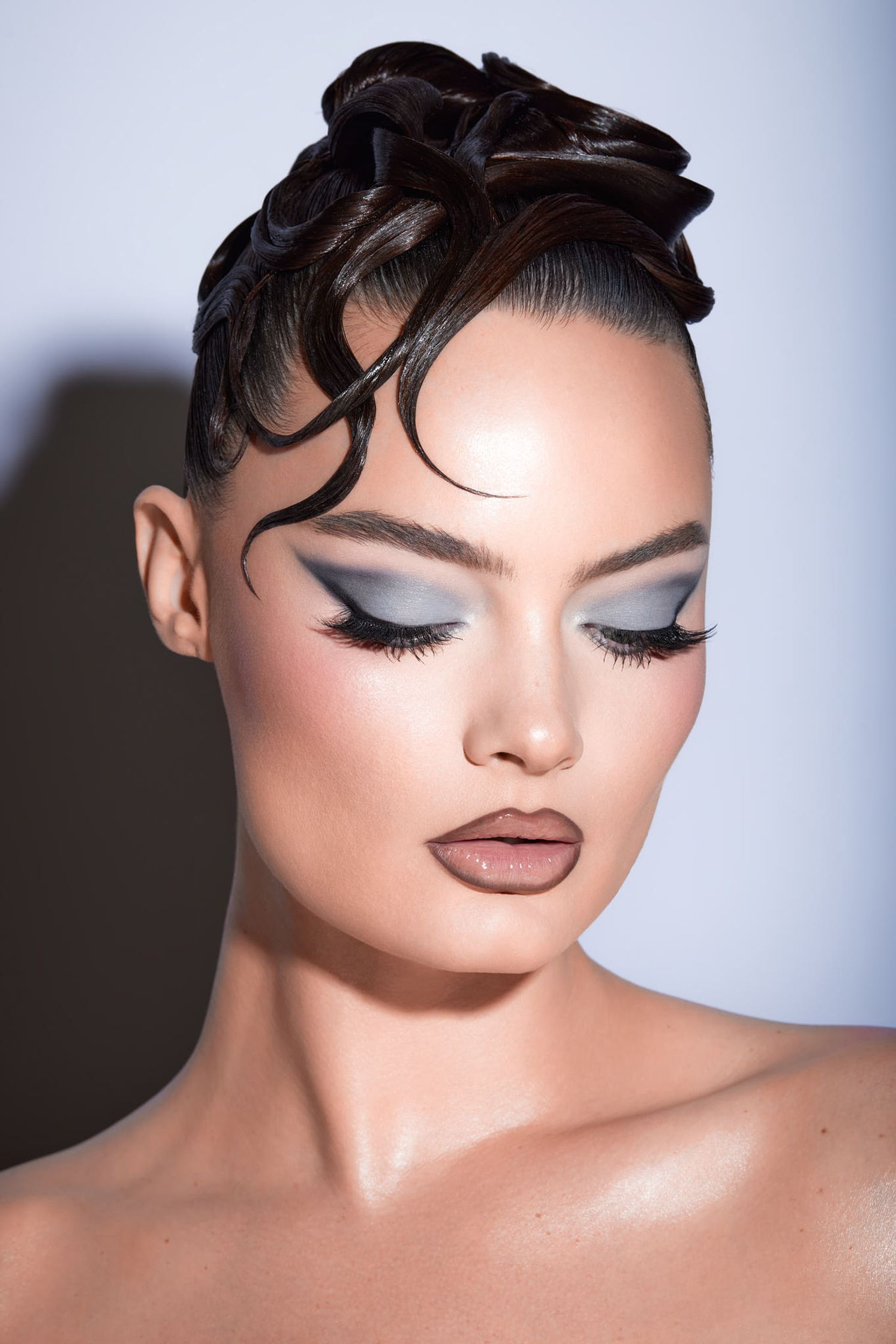 a woman with makeup on her face