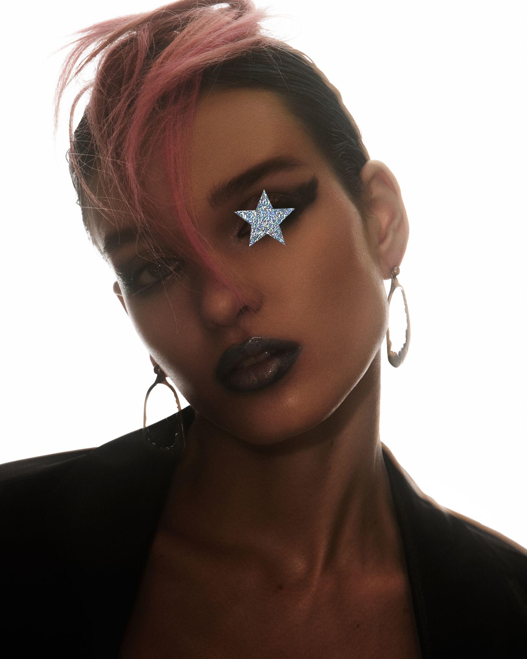 a woman with pink hair and a star on her face