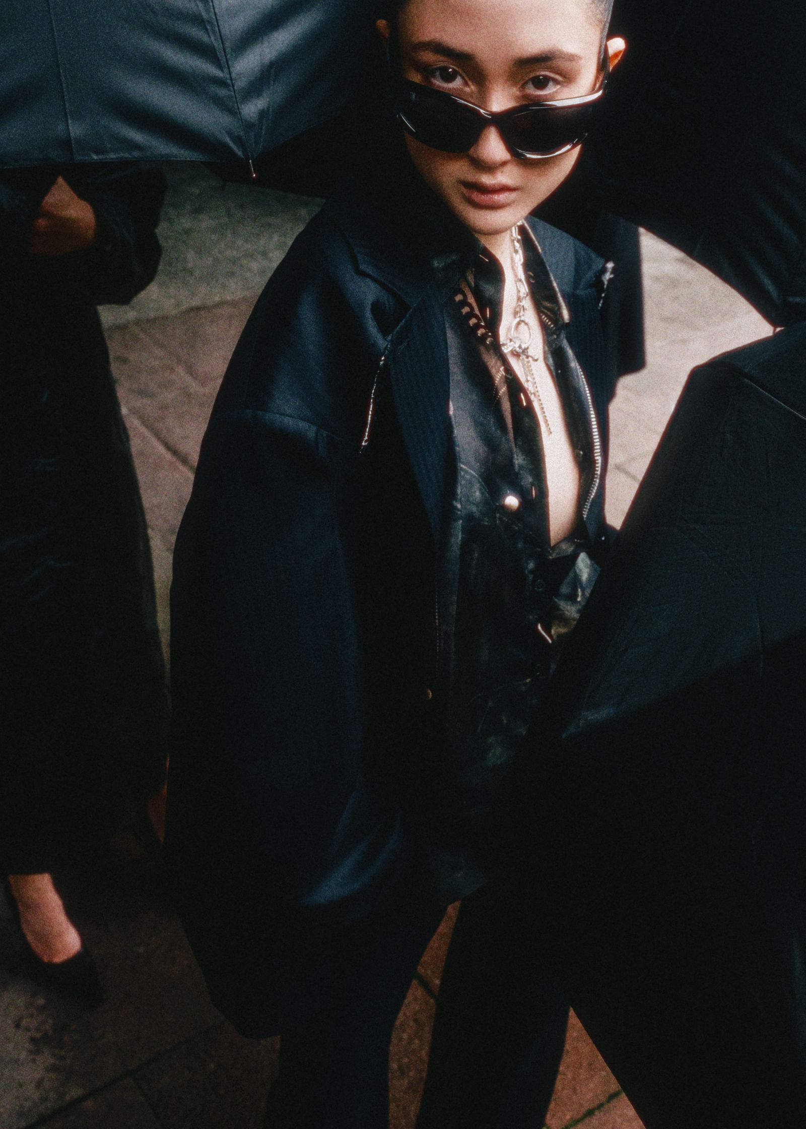 a woman holding an umbrella