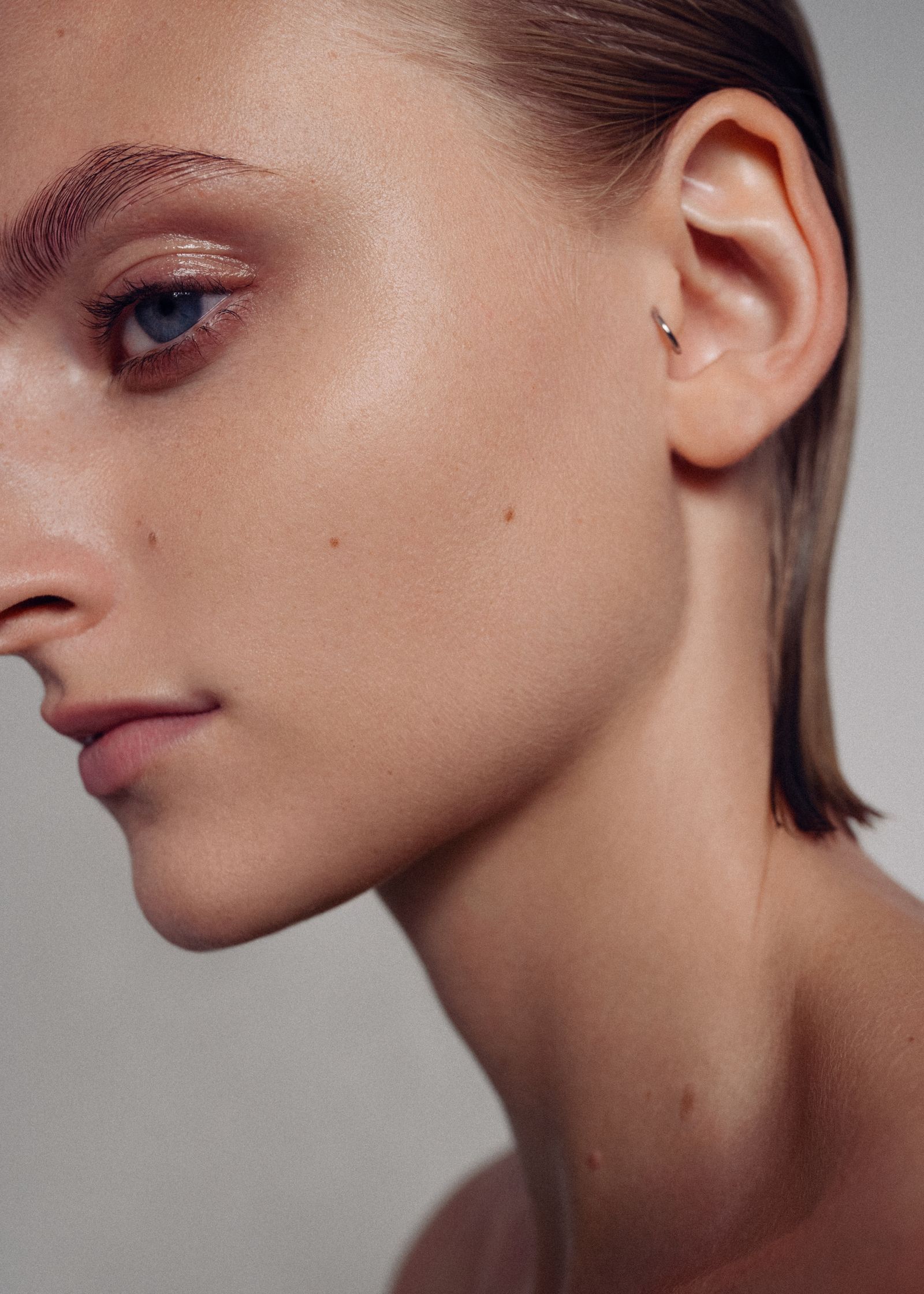 an image of a woman with a pierced ear