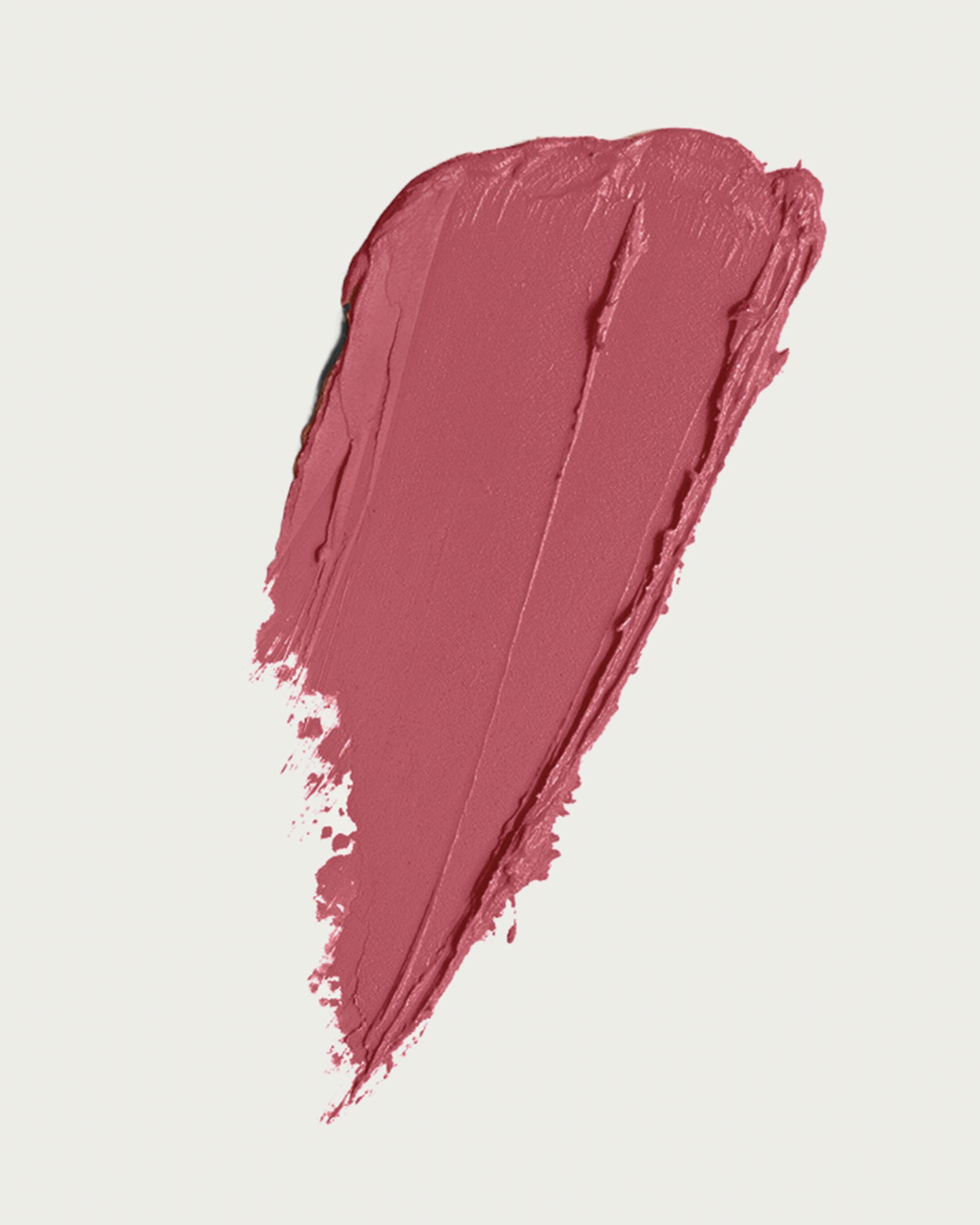 a pink lipstick swatch on a white background