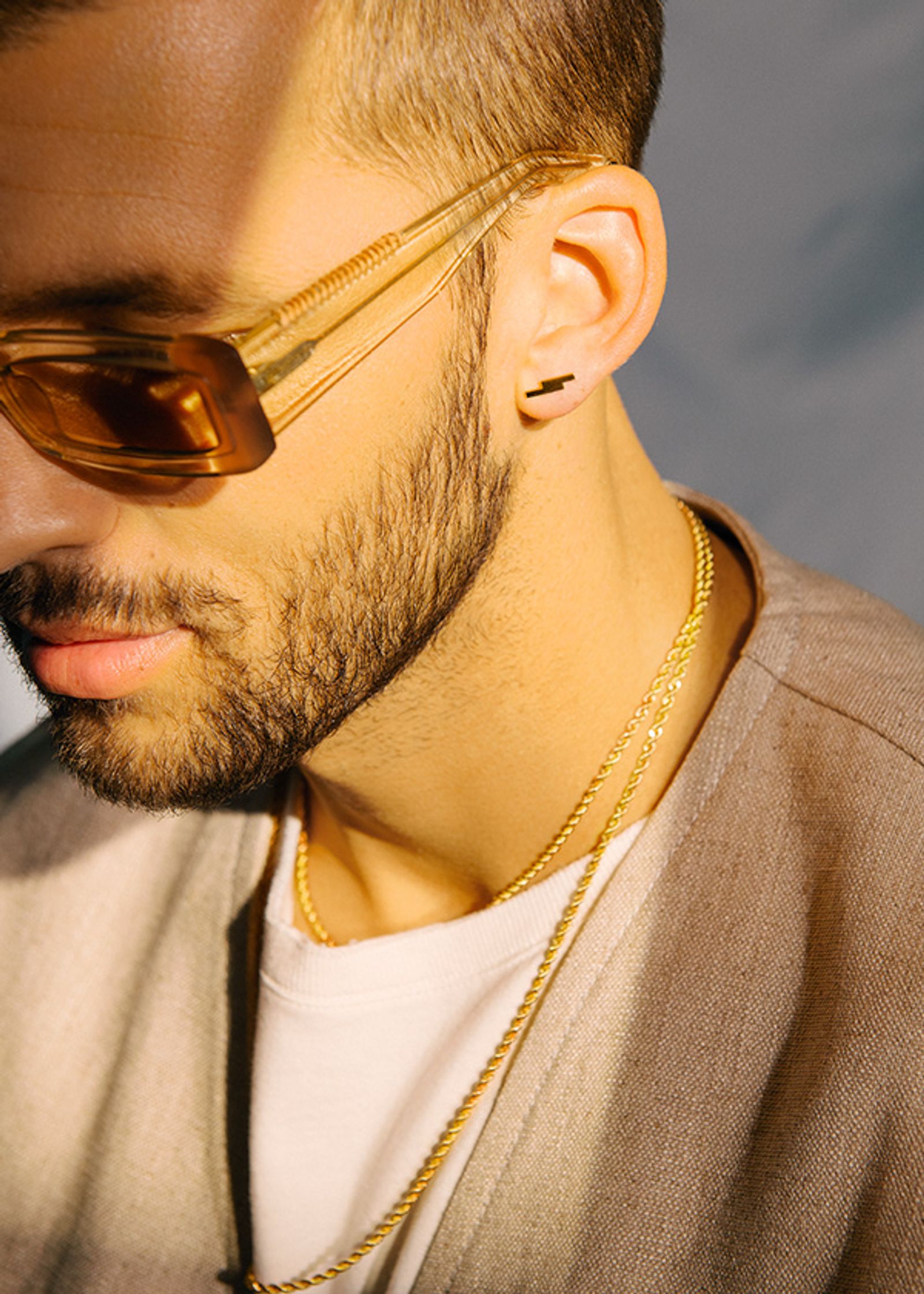 a man wearing sunglasses and a beard
