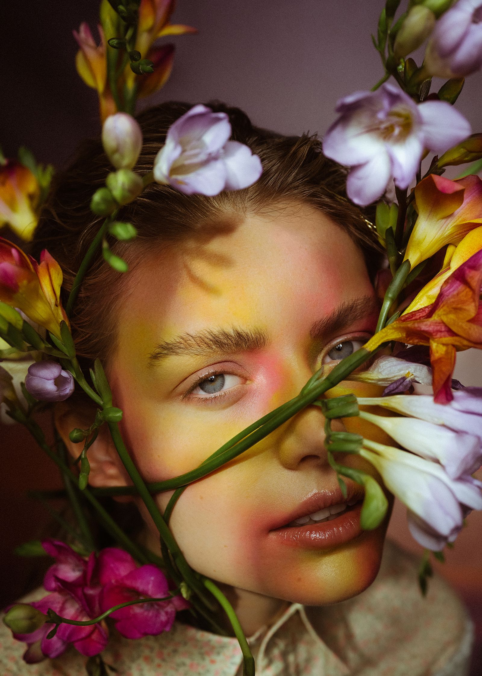 a woman with flowers on her face
