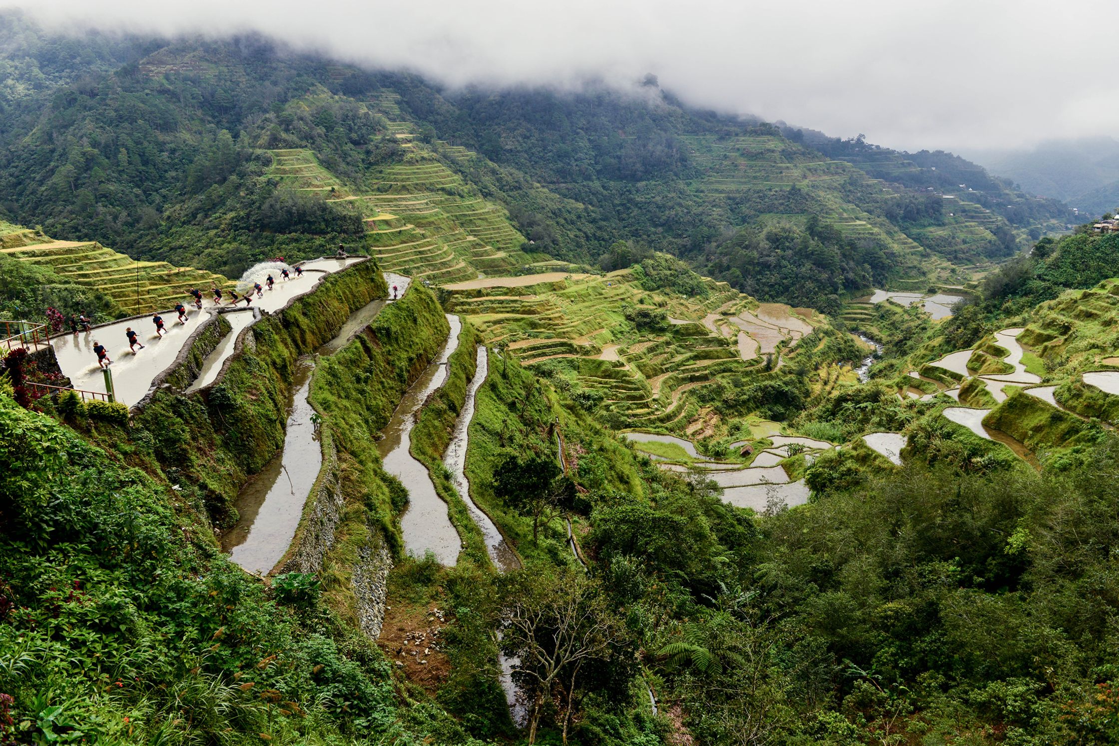 a Red Bull wake skate athlete at rice terraces in the philippines