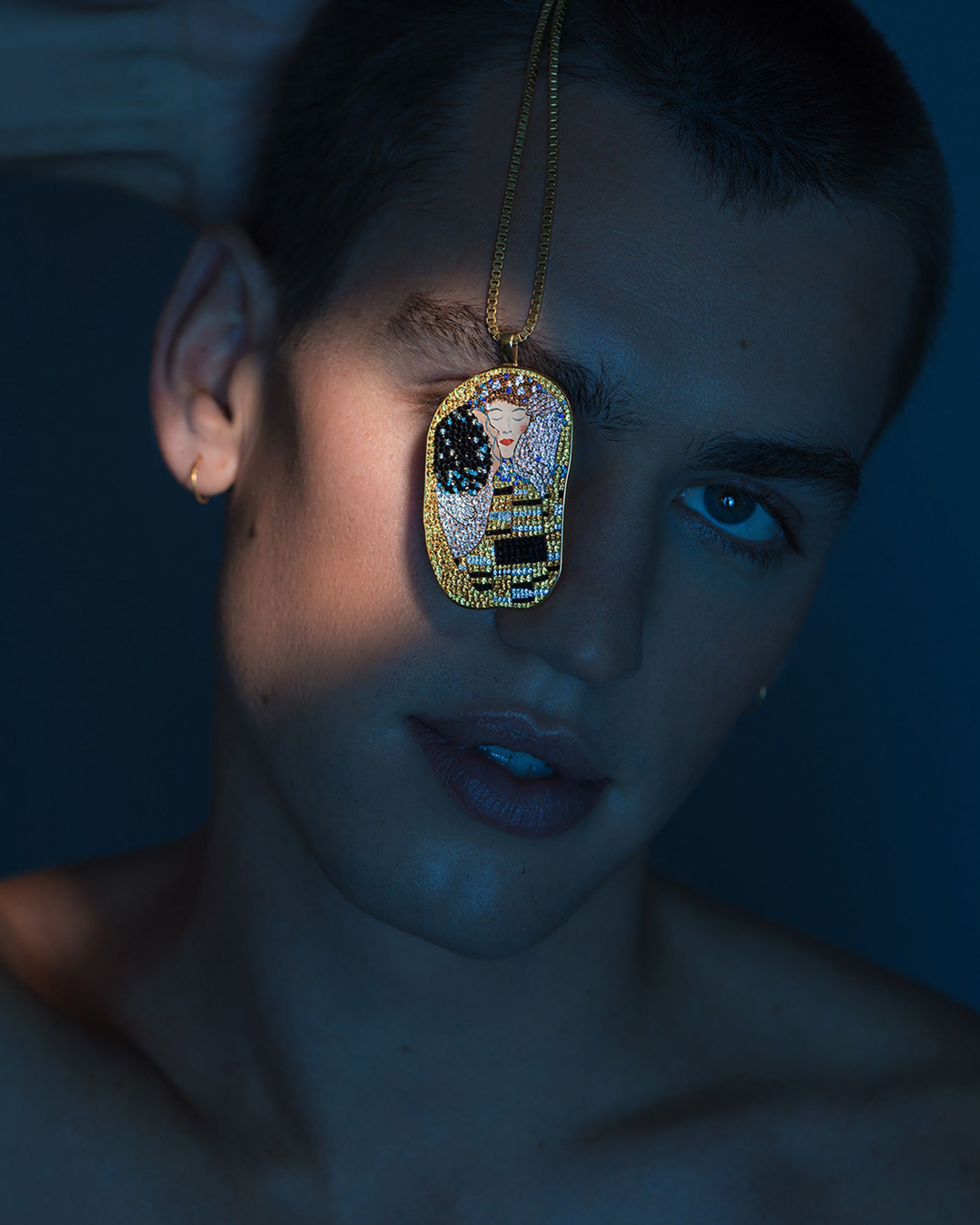 a man with a necklace on his head