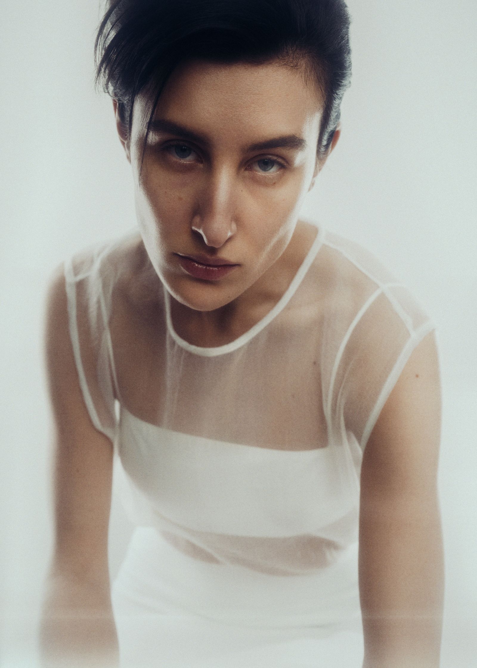a woman wearing a white shirt