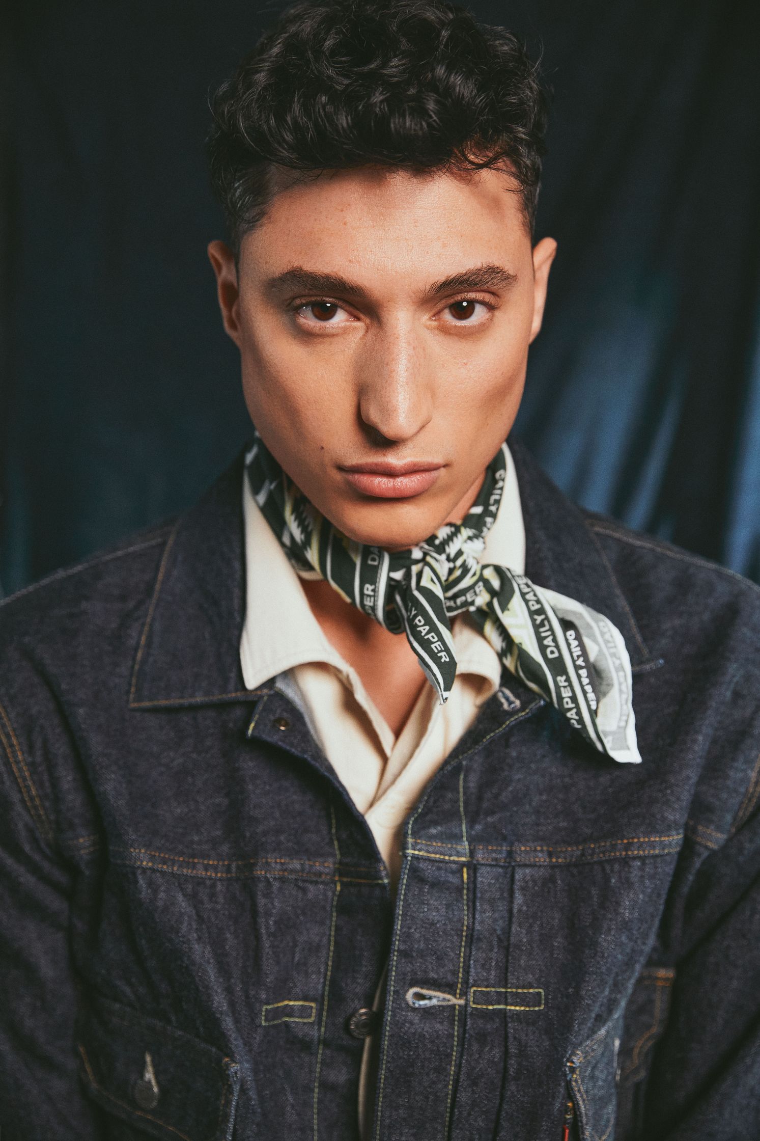 a man in a denim jacket