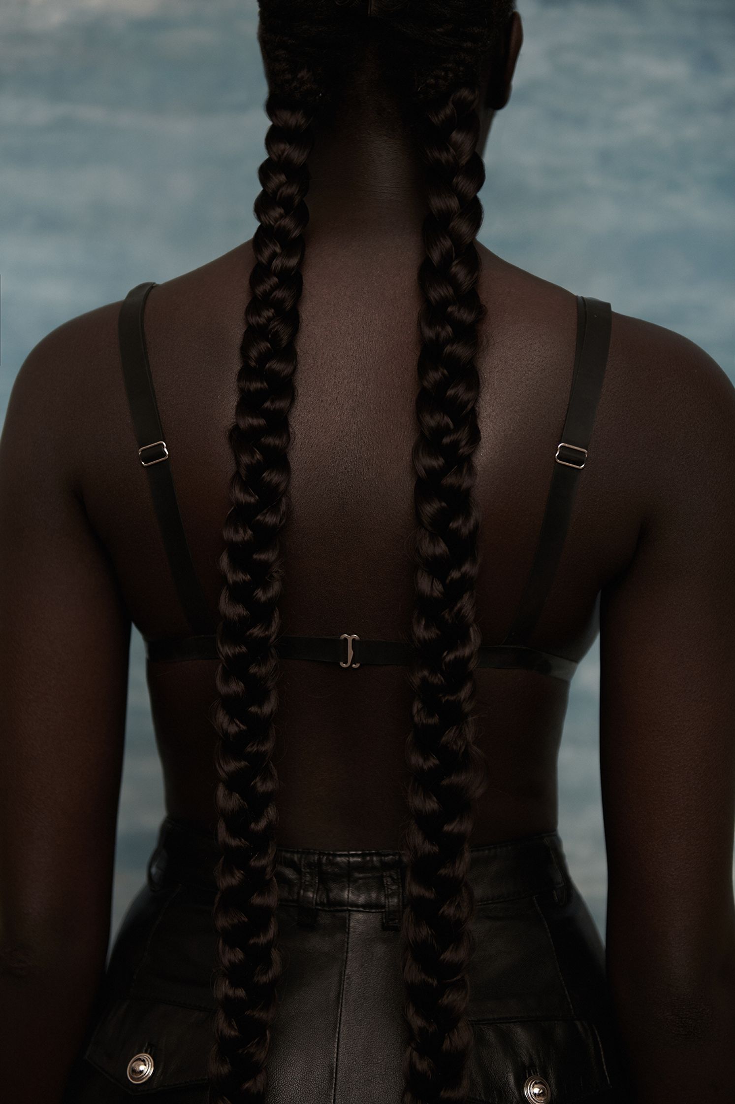 the back of a black woman with braids
