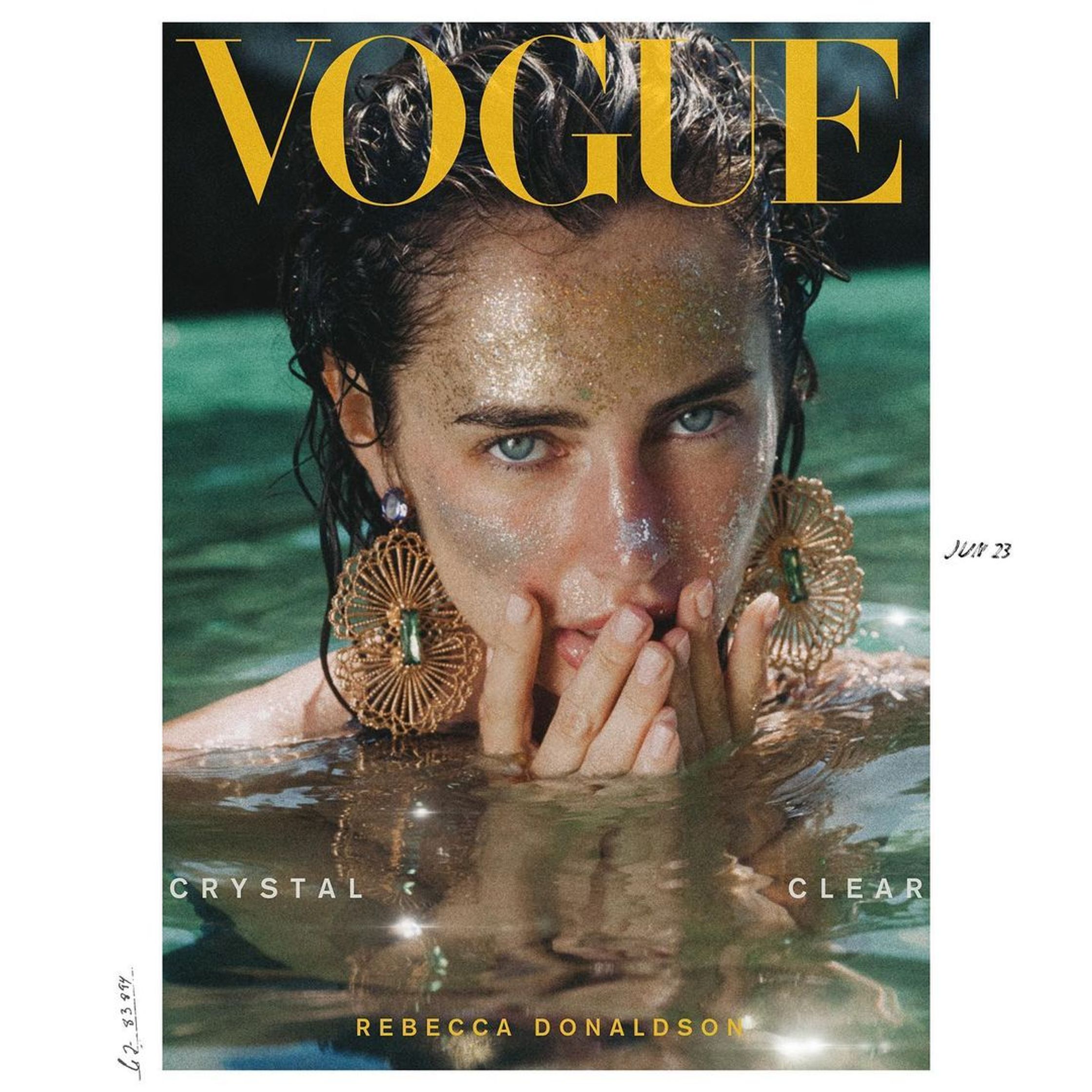 the cover of vogue magazine with a woman in the water