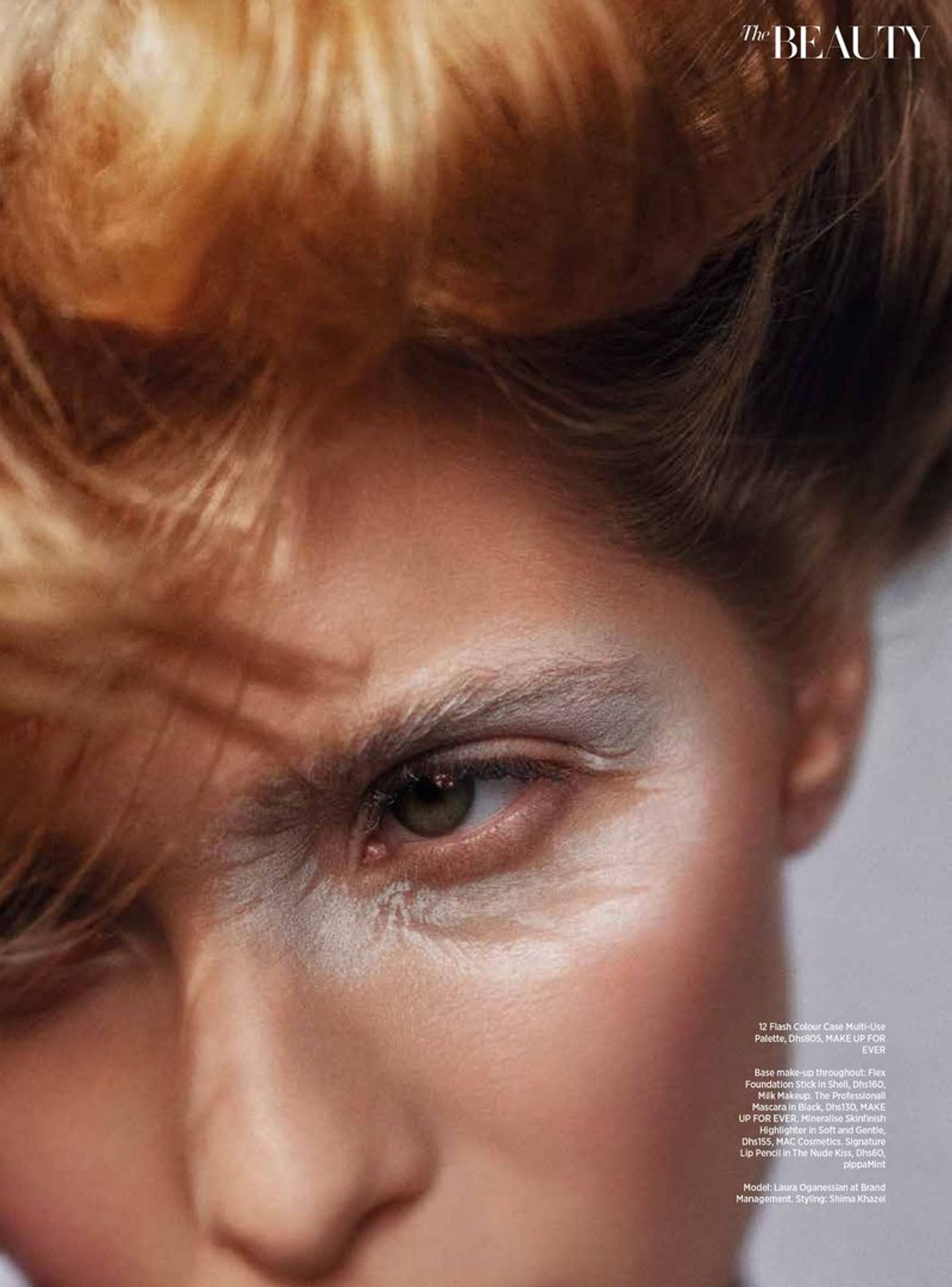 an image of a woman with white makeup on her face