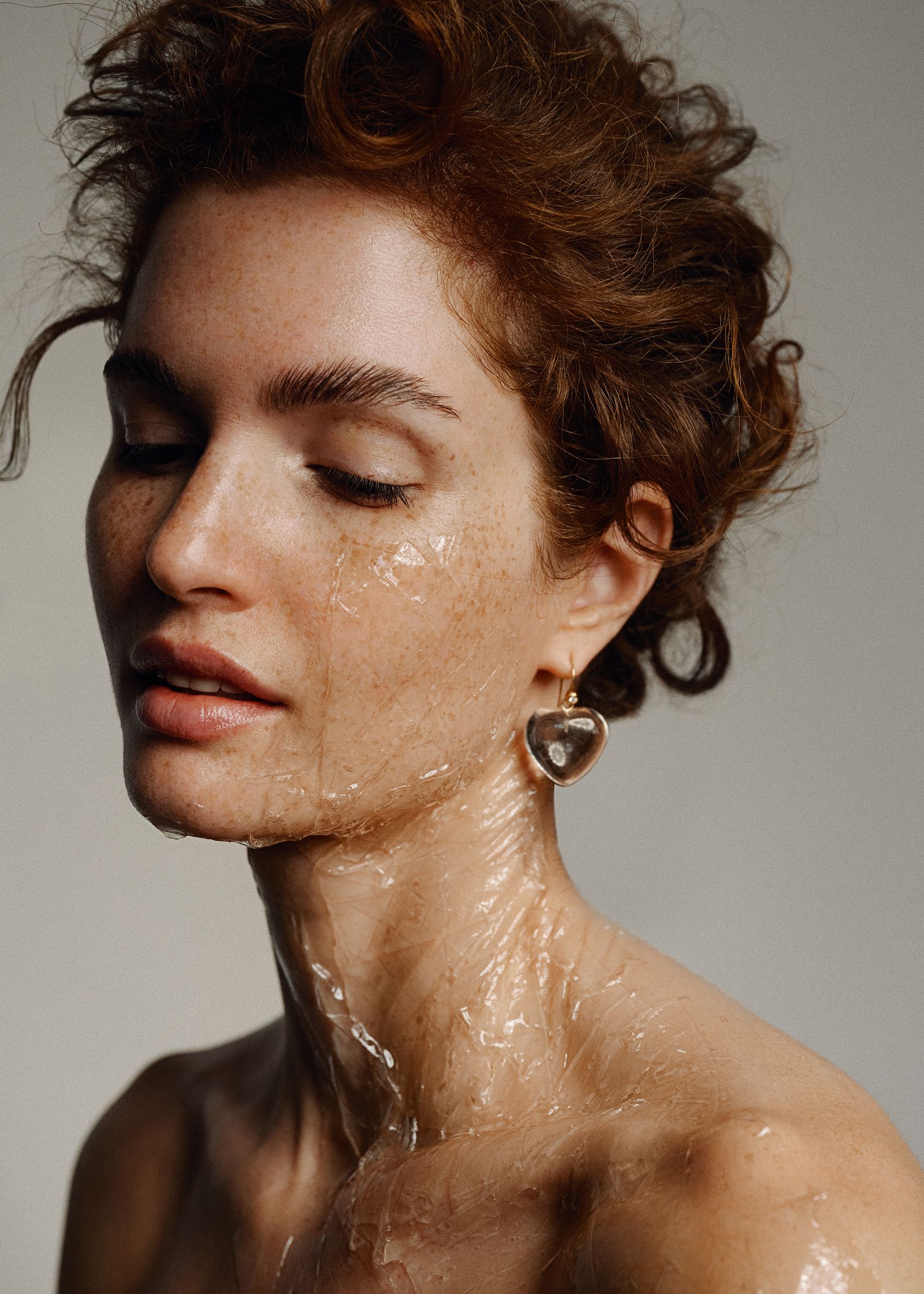 a woman with her face covered in water