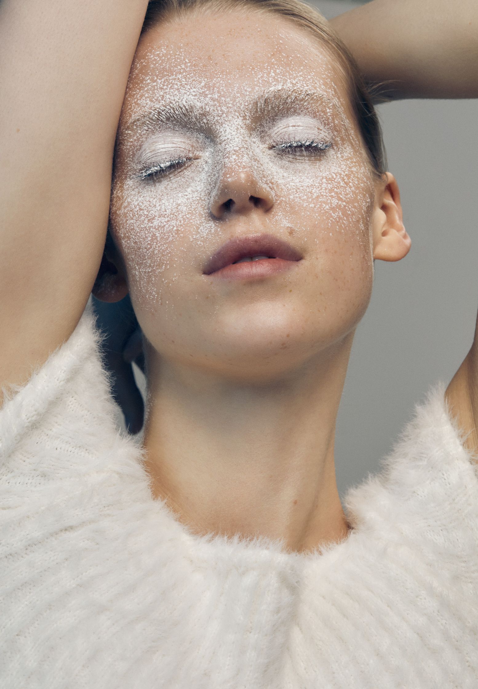 a woman with white powder on her face fashion photographer Fraukle Fischer