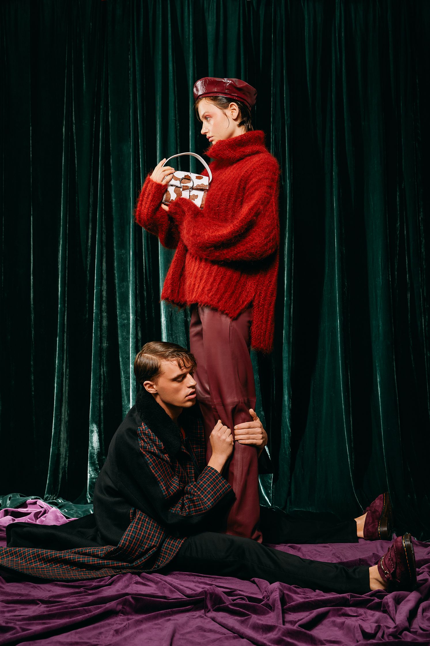 a man in a red sweater and a woman in a red sweater