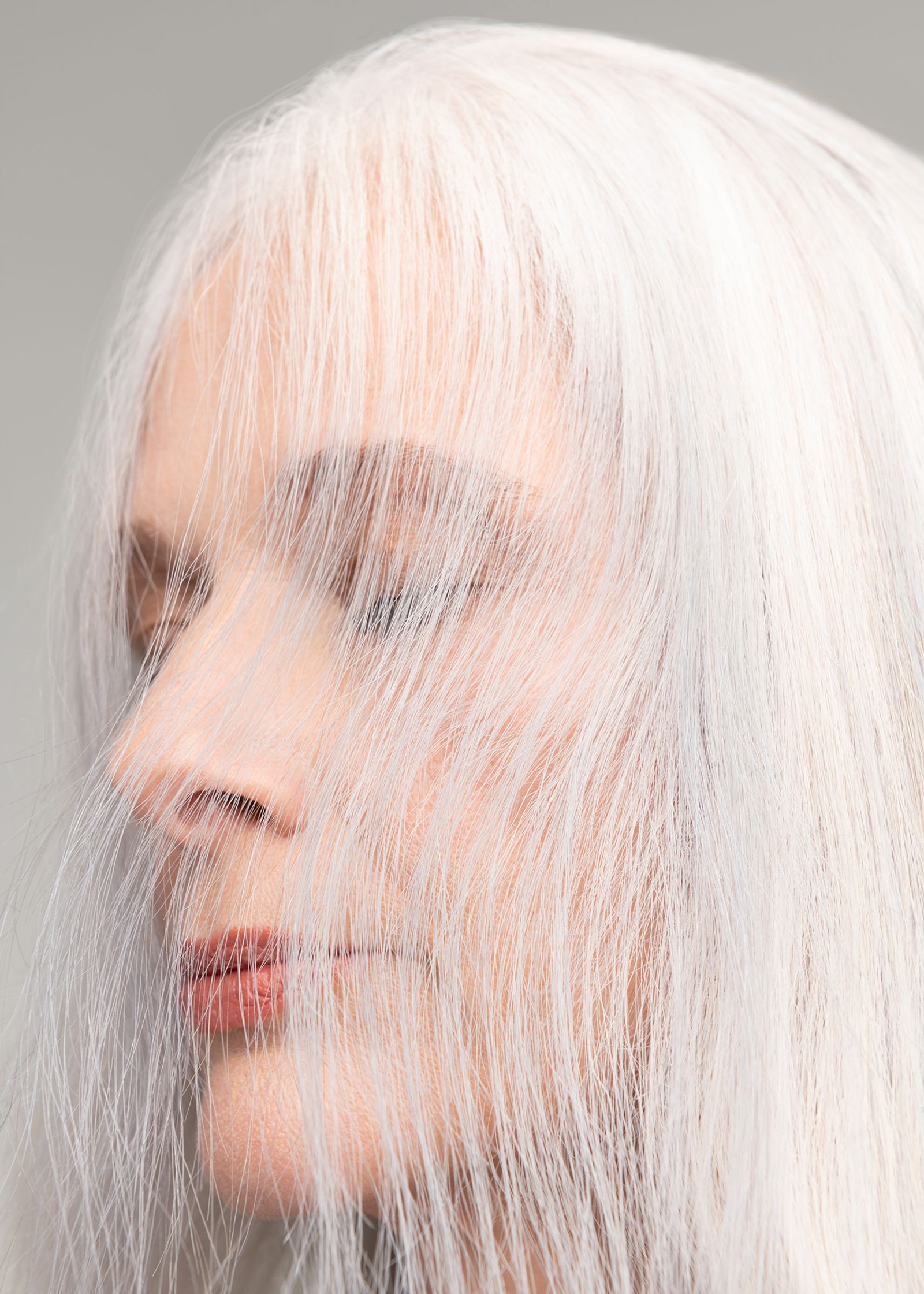 a woman with long white hair