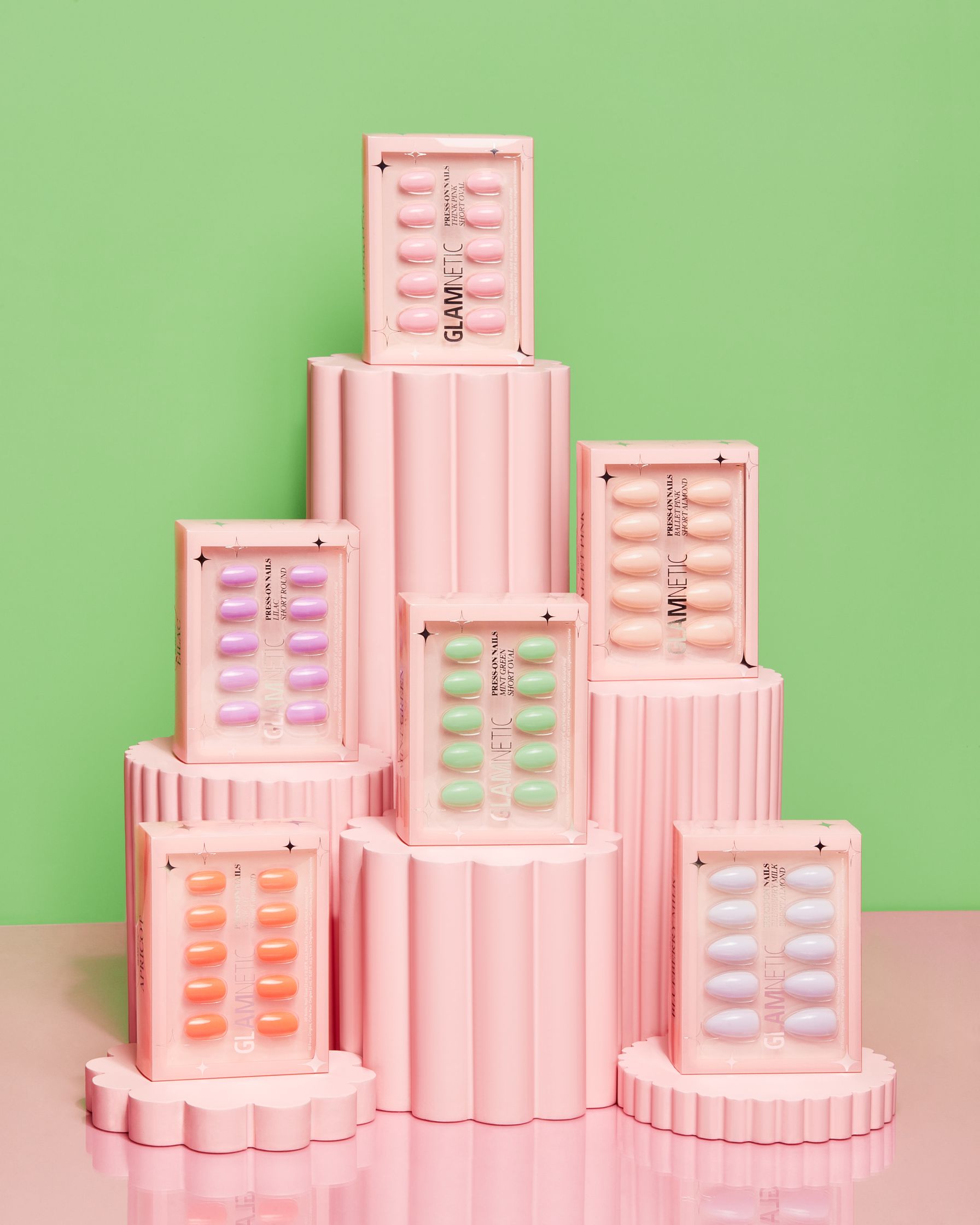 a stack of pink boxes stacked on top of each other