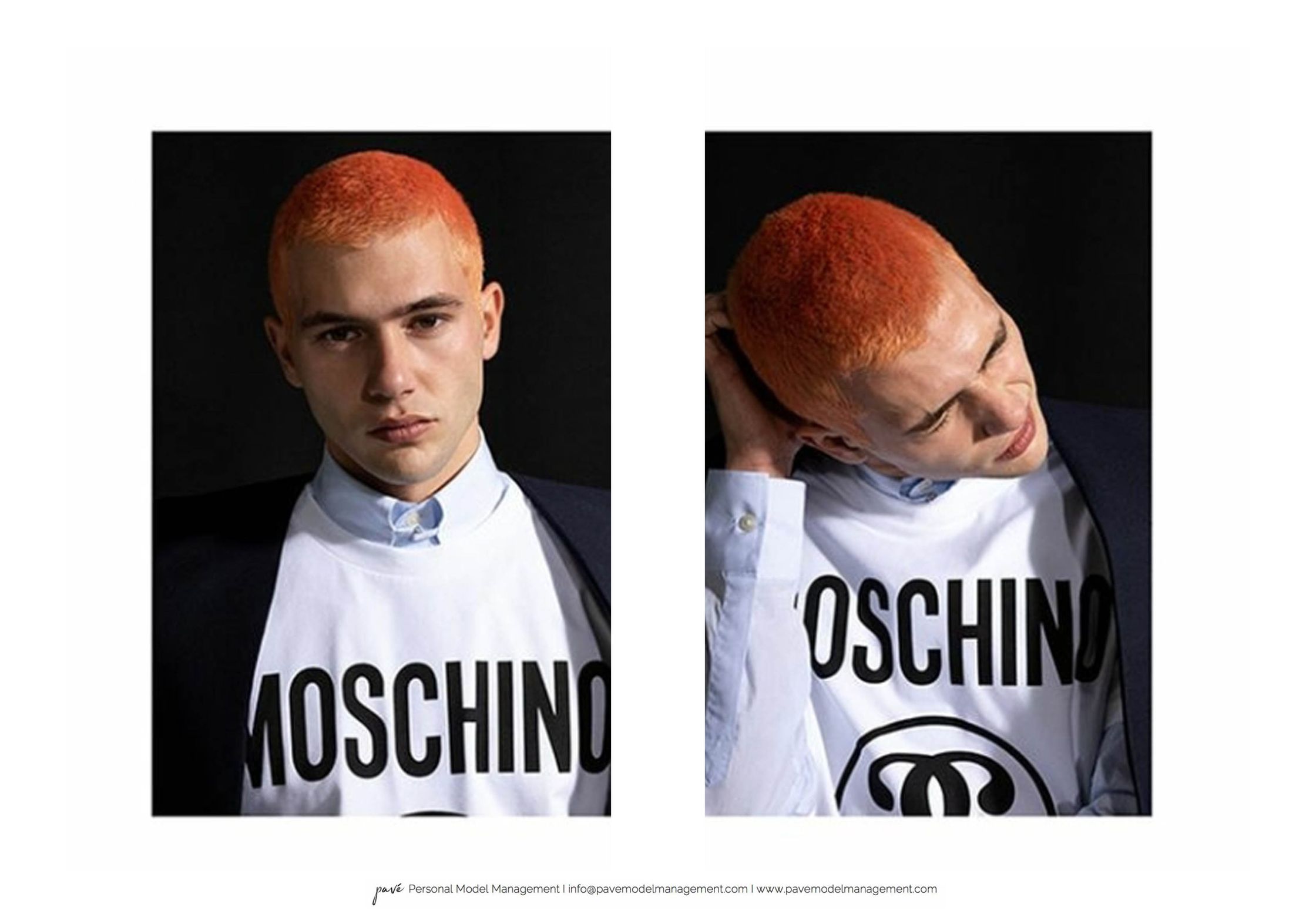 Two young men with orange hair and "MOSCHINO" shirts posing against a dark background.
