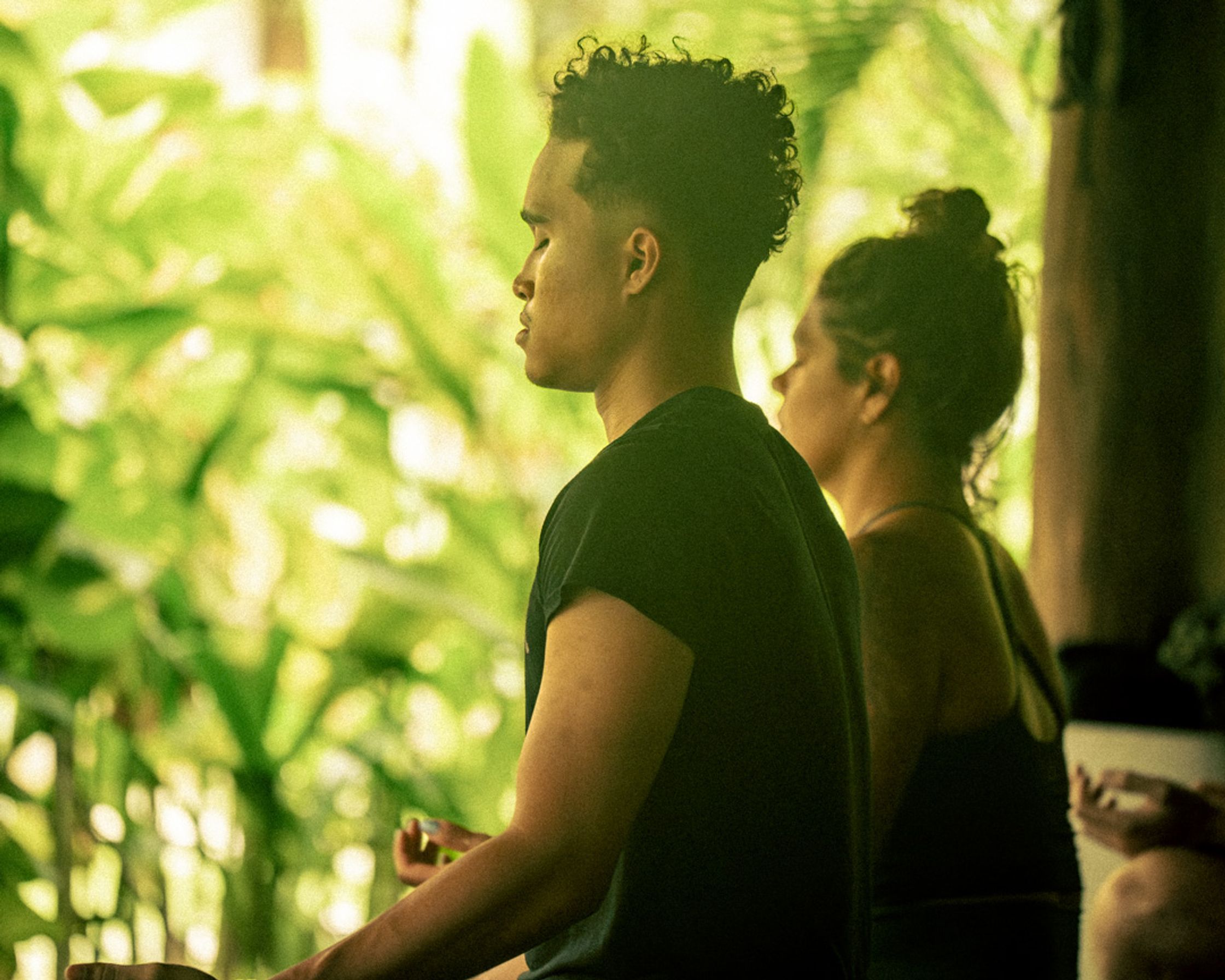 Post-surf serenity: Grounding the body and mind in front of the wild, untamed greenery of South Lombok.