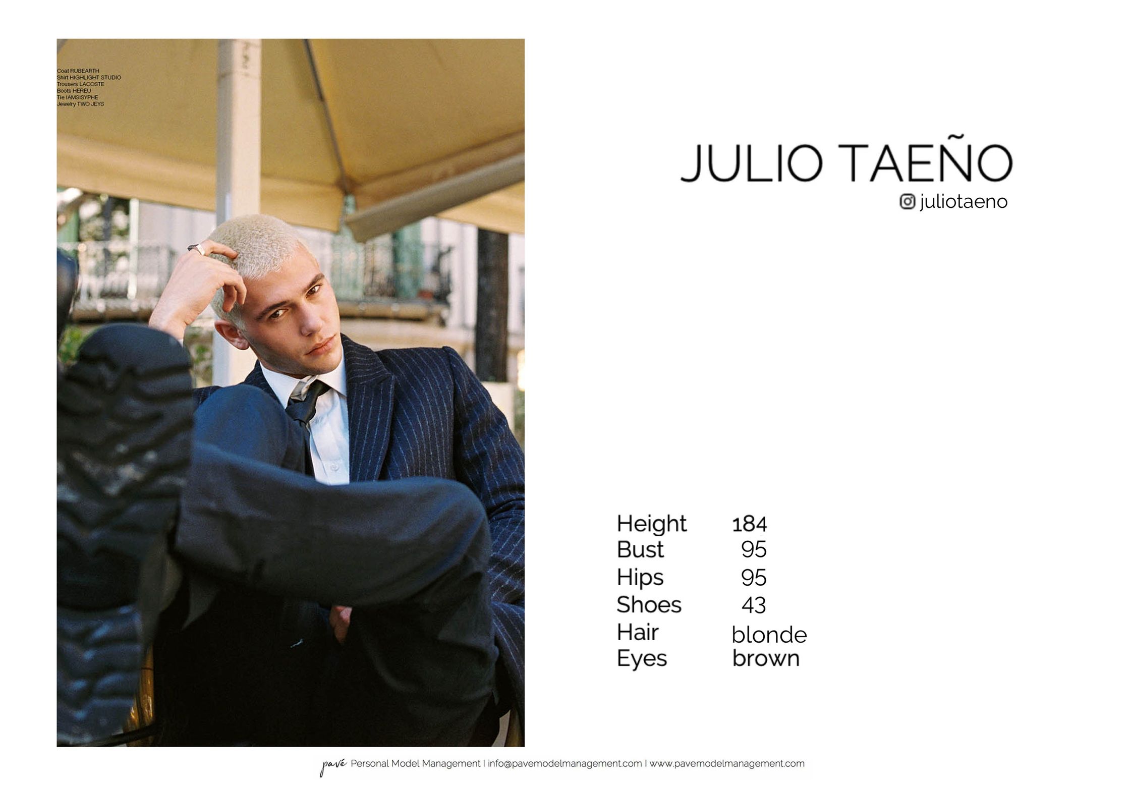 A male model with blonde hair in a striped suit sits with his legs crossed, looking directly at the camera, with his stats listed on the right.