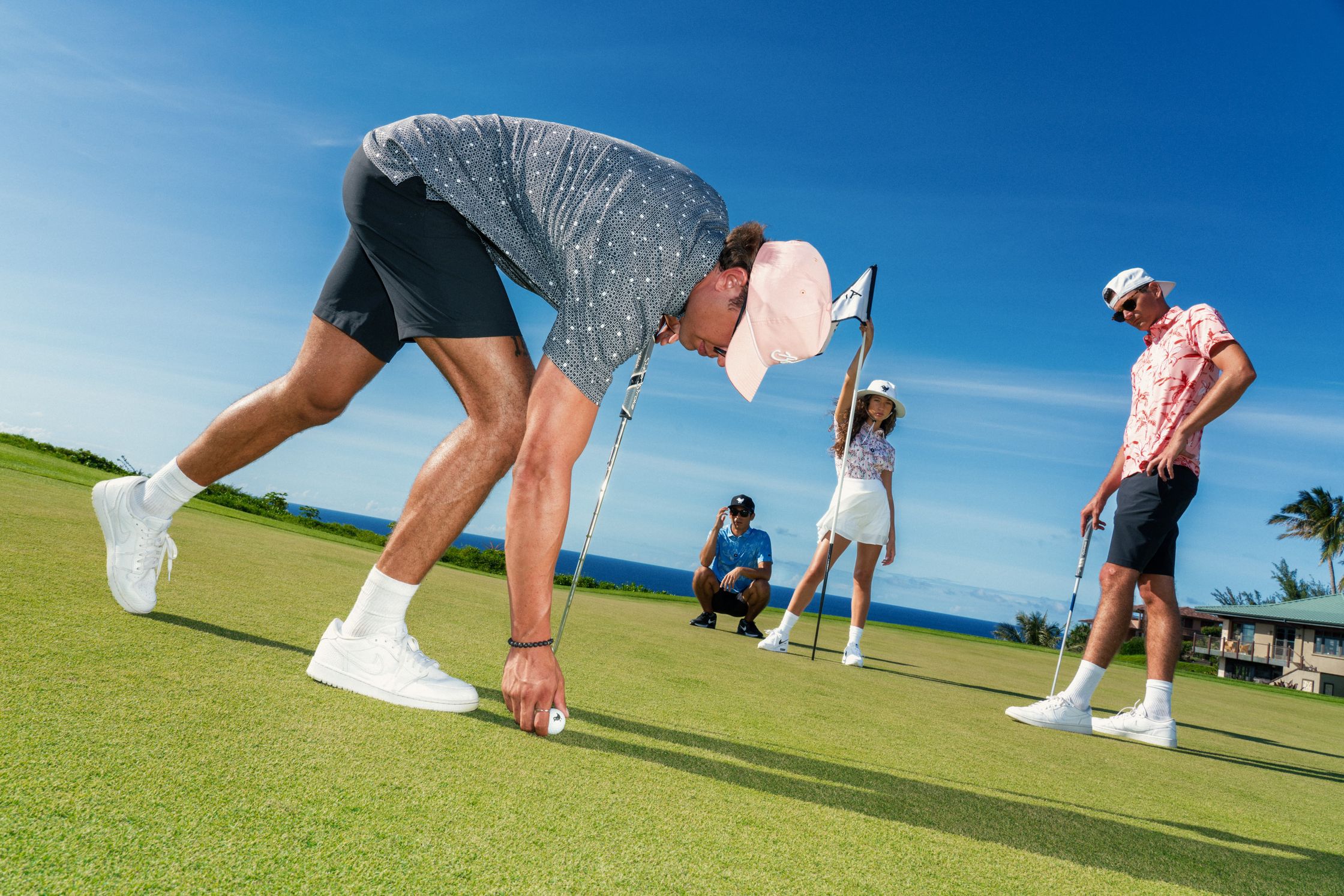 a group of people on a golf course