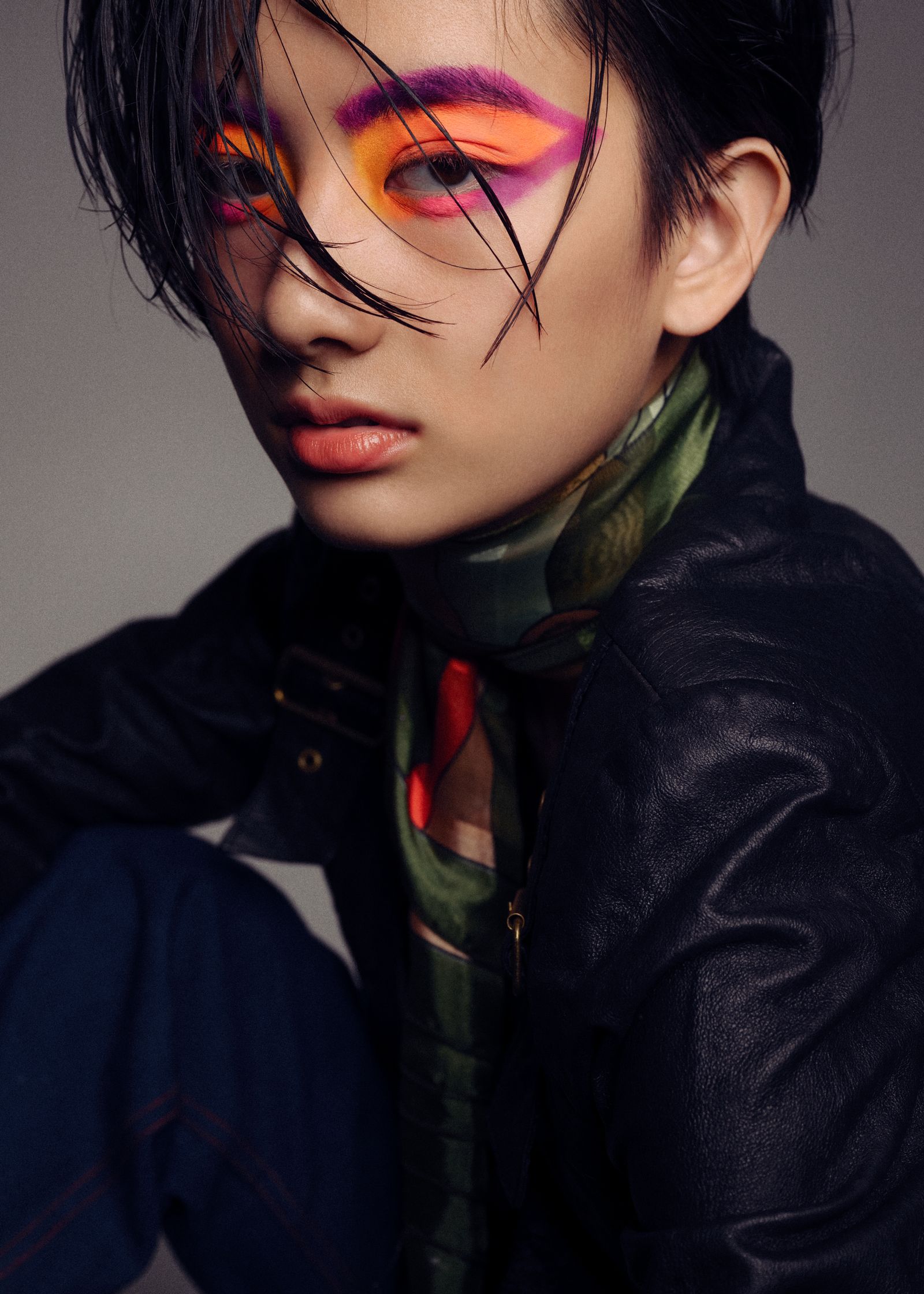 a girl wearing a black jacket
