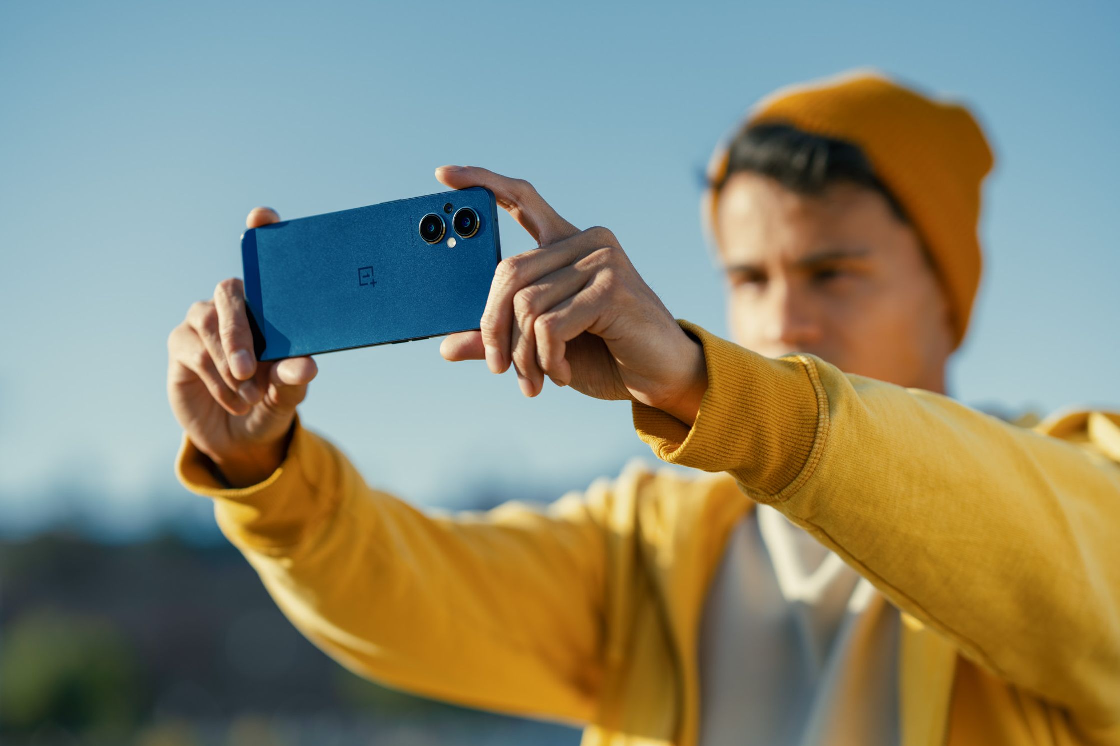 a man is taking a picture with his phone
