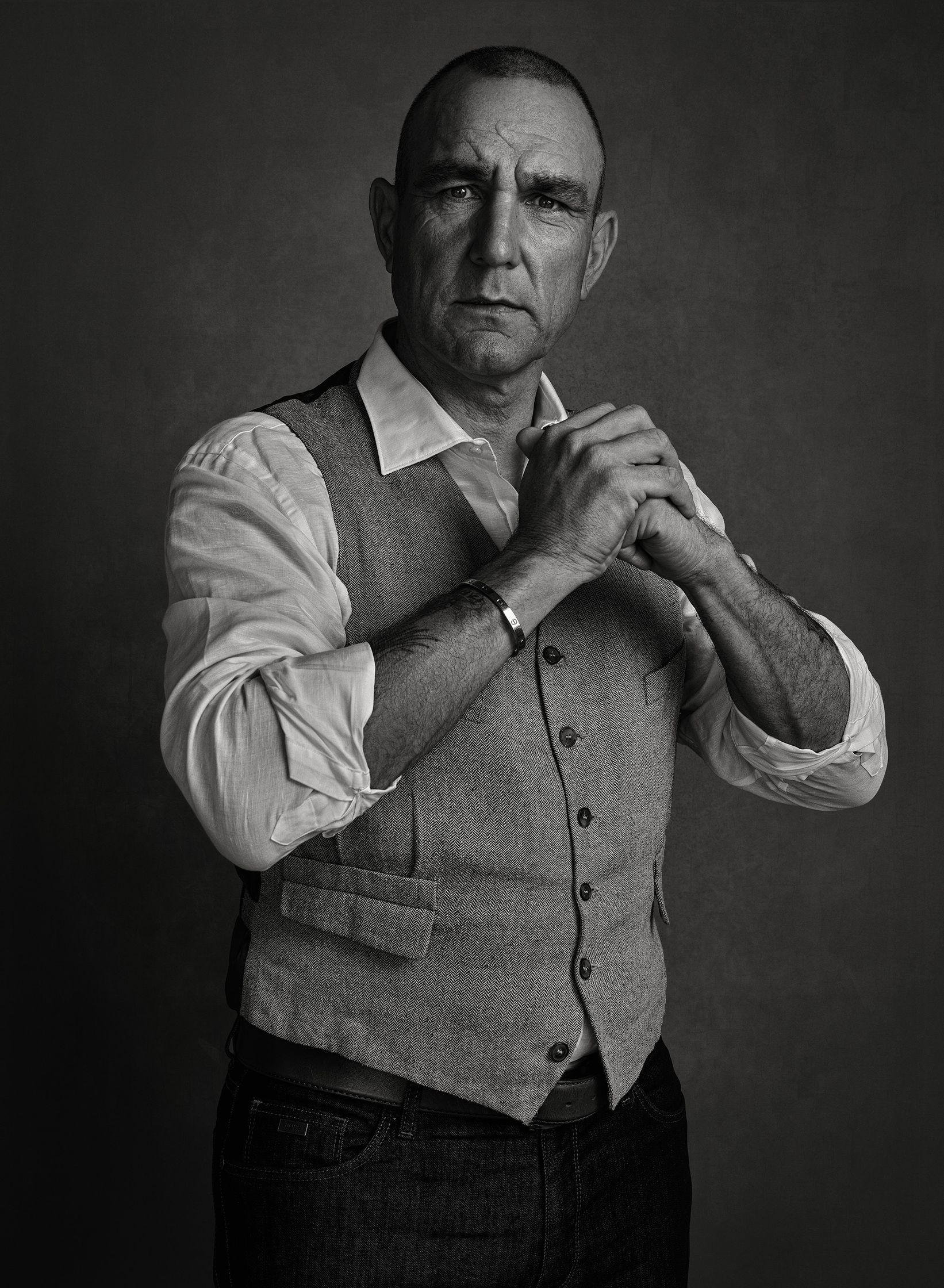 a black and white photo of a man posing