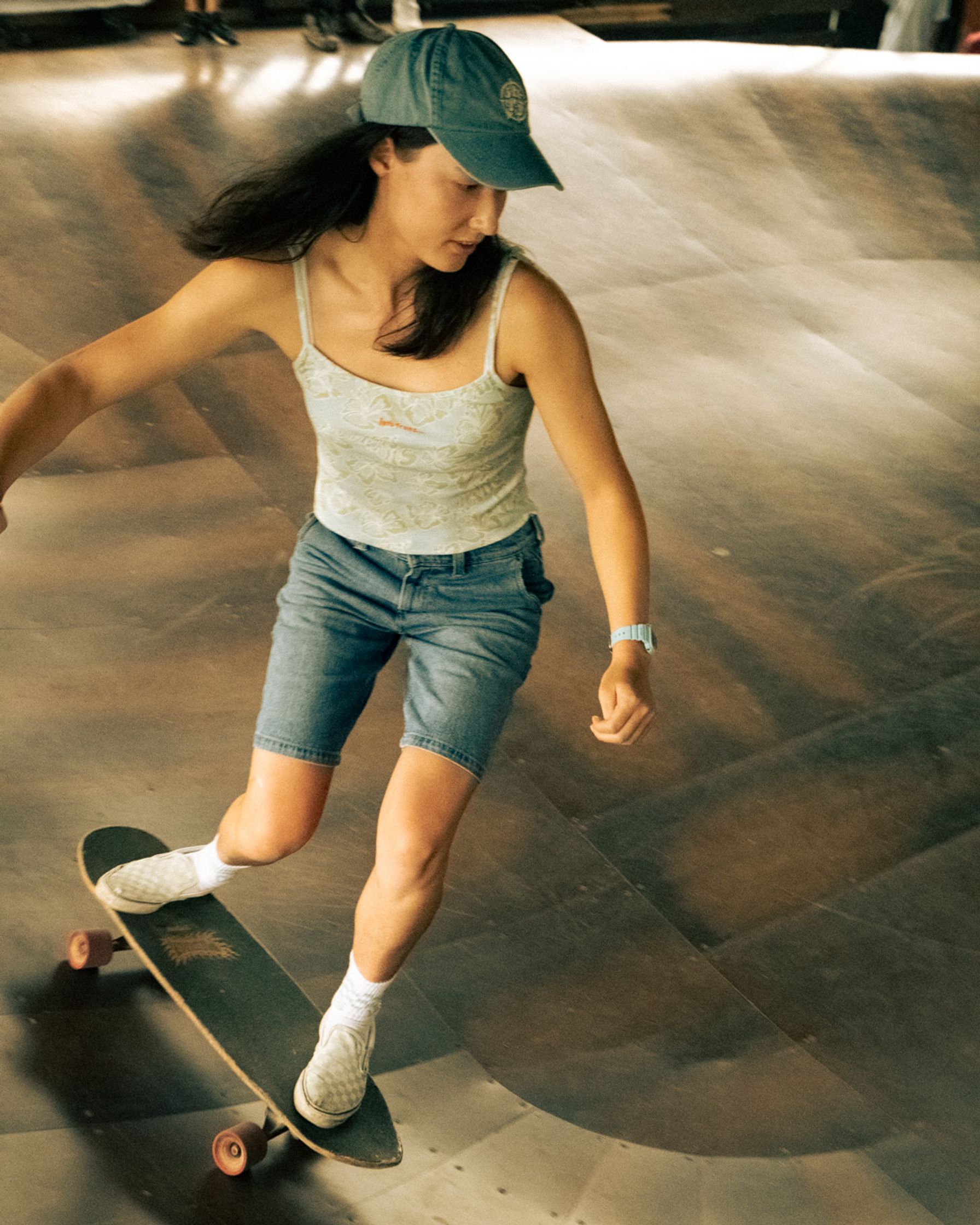 Capturing the flow and focus of a woman on a surf-skate
