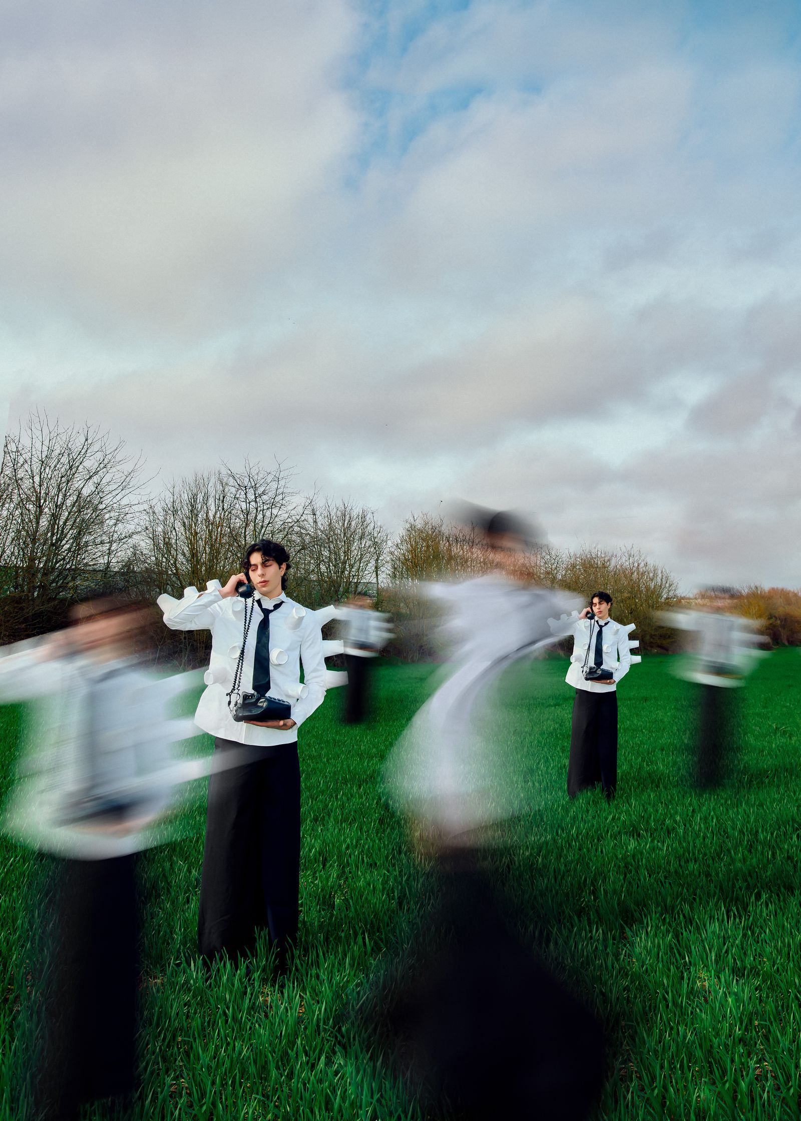 a group of people in uniform standing in a field