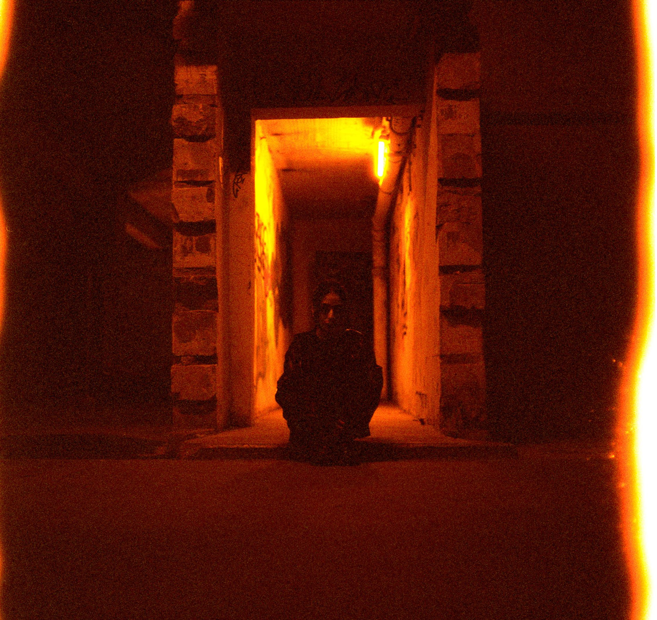 Coverportrait of a Musician shot with Cinestill Redrum in a Constructioniste on a Hasselblad 500cm