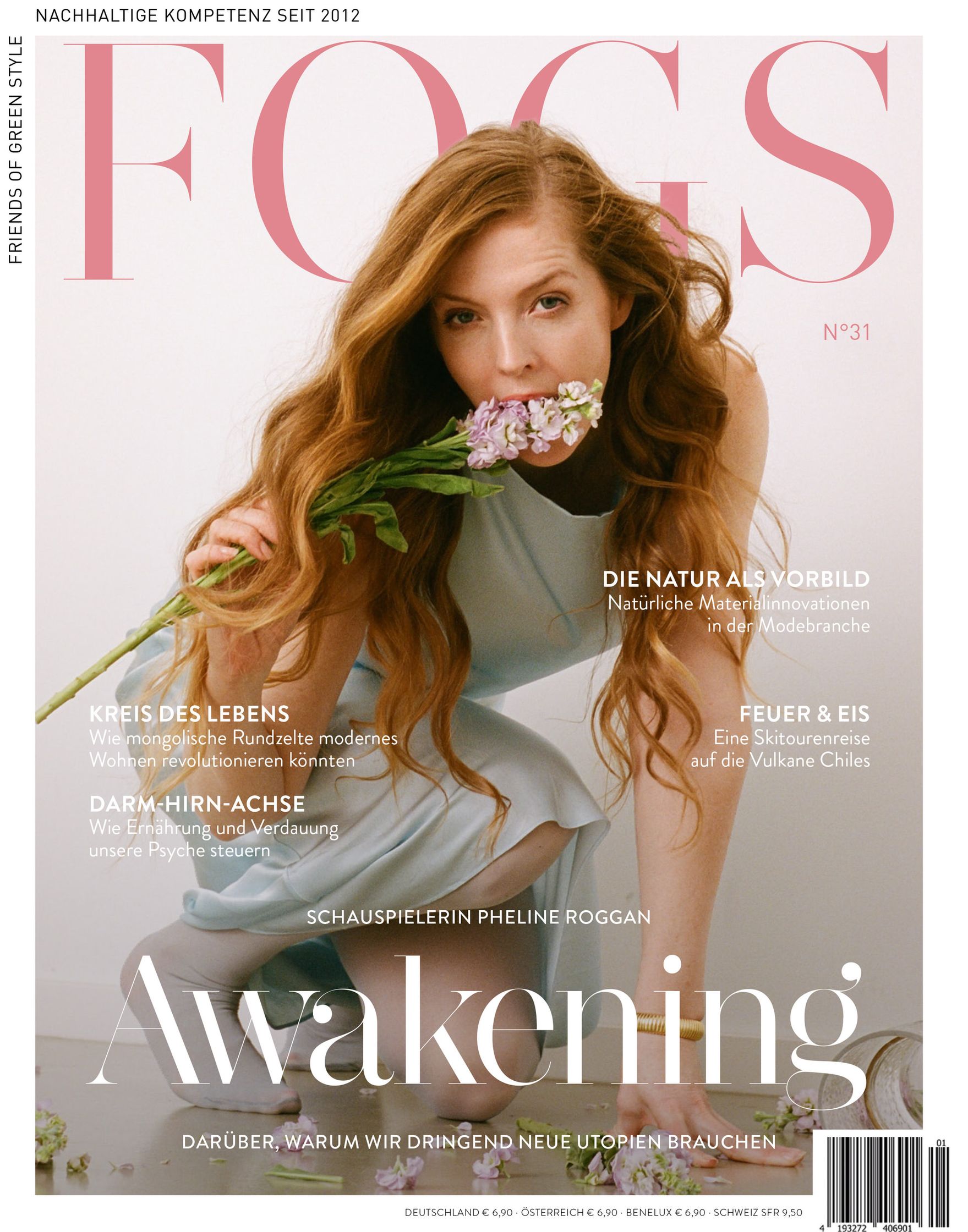 the cover of Fogs Magazine with Pheline Roggan holding flowers