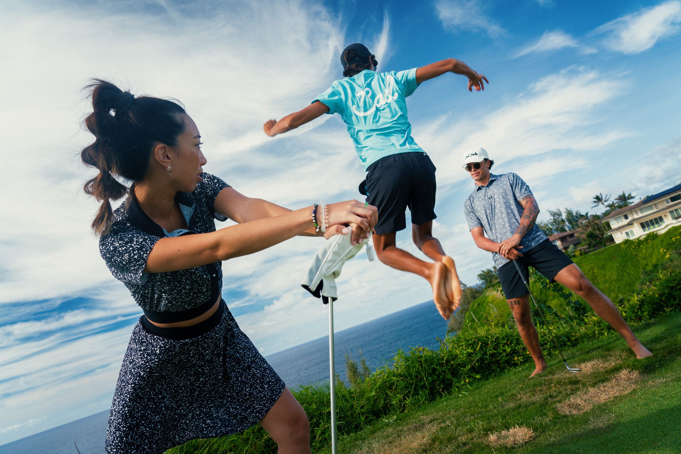 a group of people playing a game on a golf course