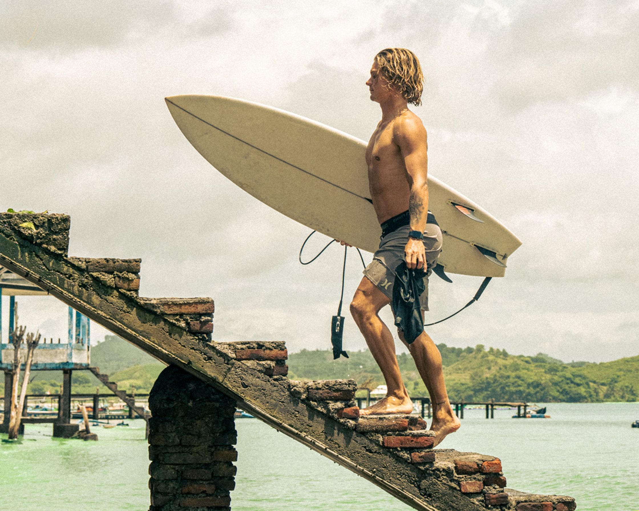 Stairway to surf: Capturing the perfect symmetry between LMBK's tropical architecture and the raw beauty of the coastline.