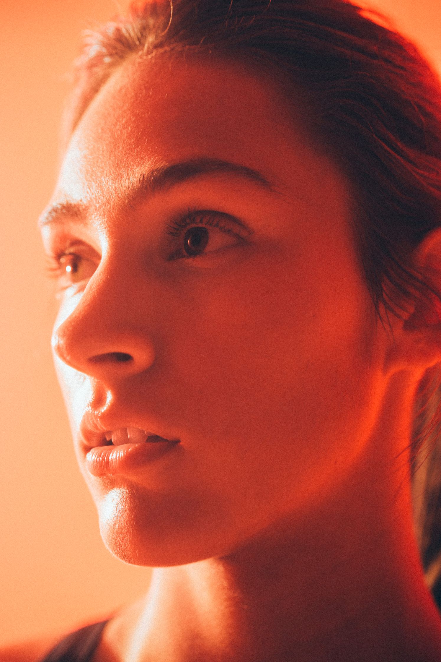 a close up of a woman staring off into the distance woman health magazine