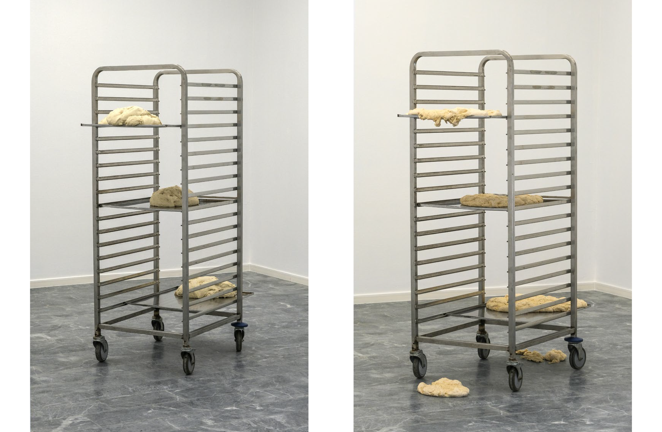 Two metal bakery racks with raw bread dough, one on the left with dough on three shelves, and one on the right with dough on two shelves and the floor.