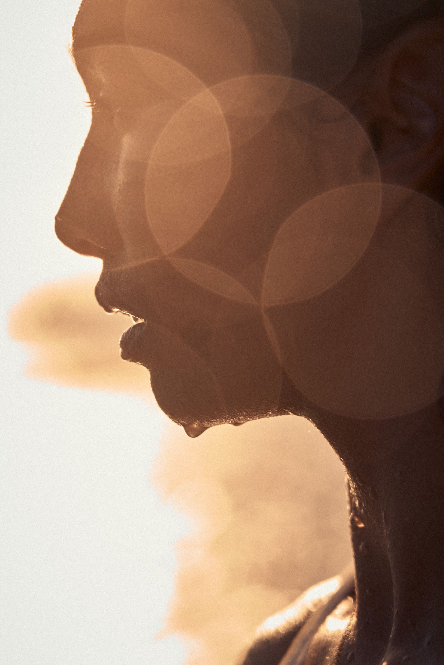 a silhouette of a woman's face