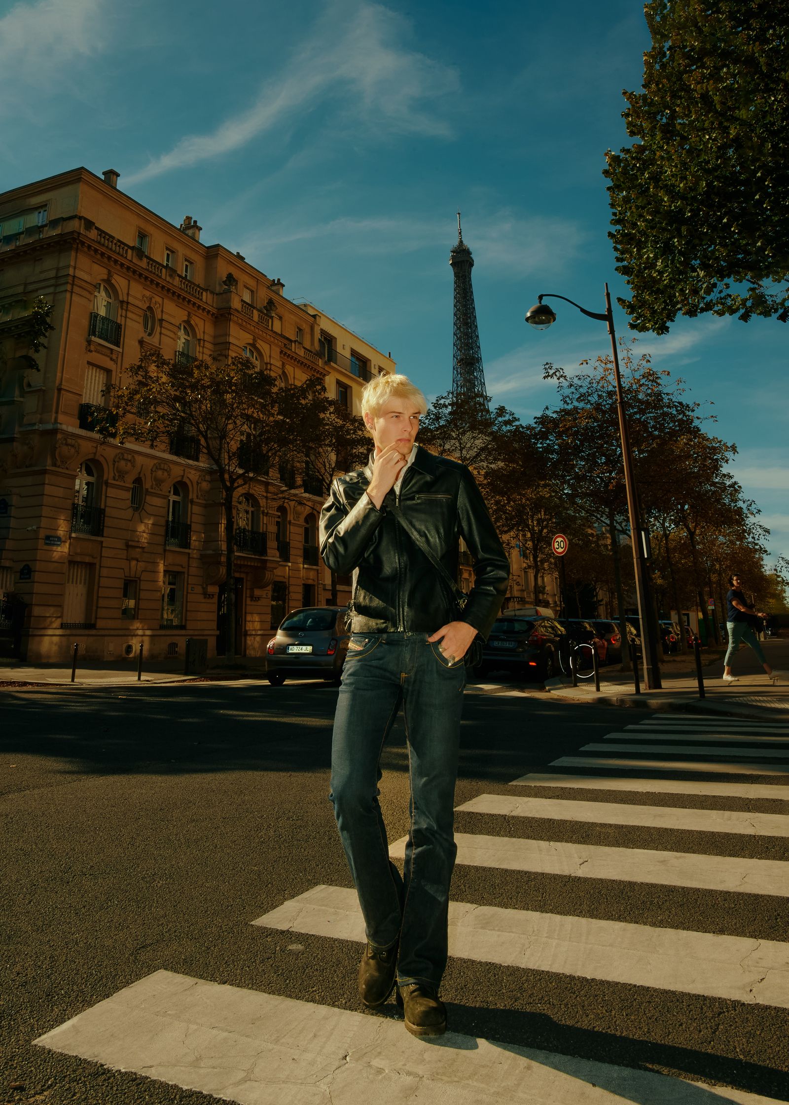 the man is wearing a black jacket