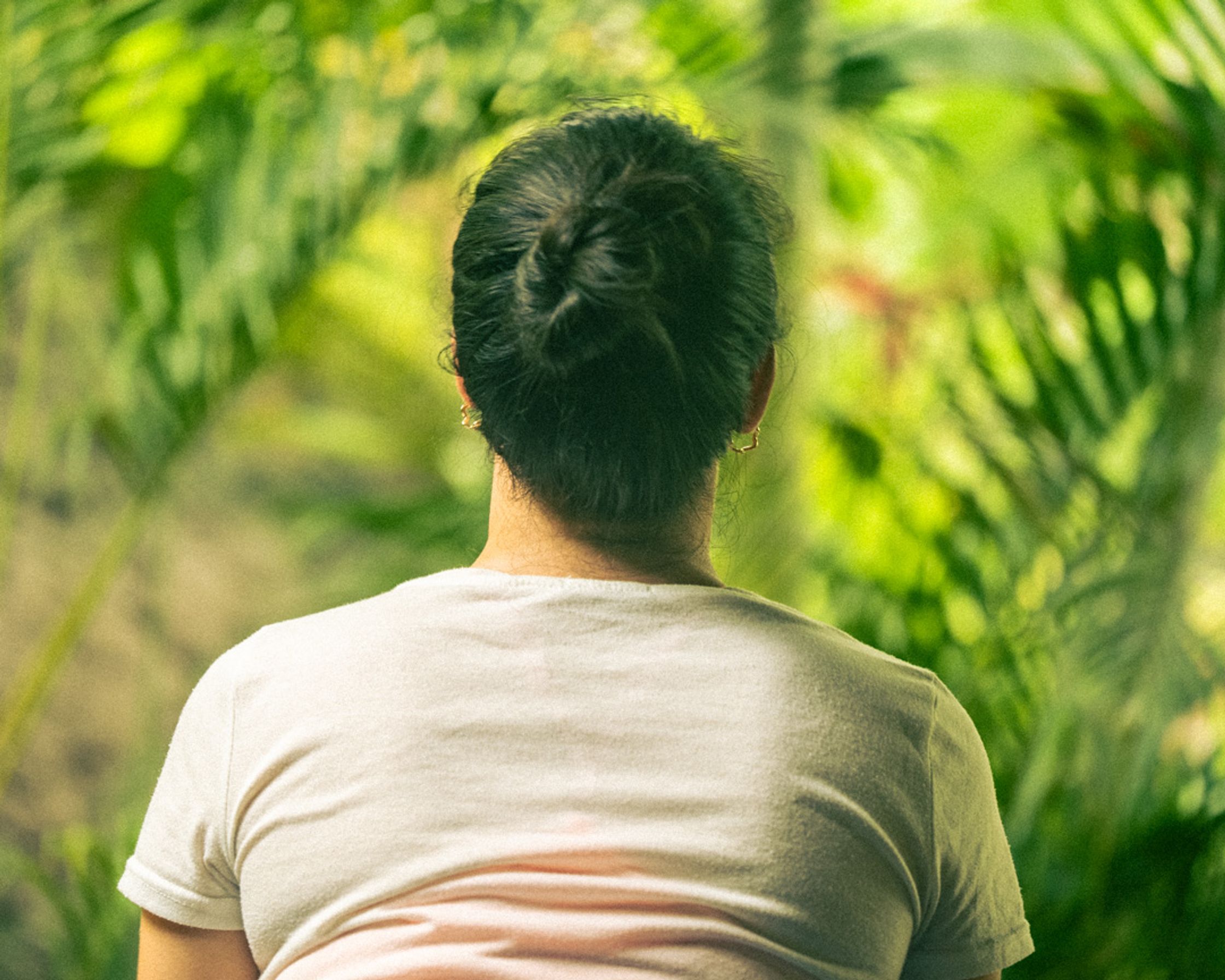 Post-surf serenity: Grounding the body and mind in front of the wild, untamed greenery of South Lombok.