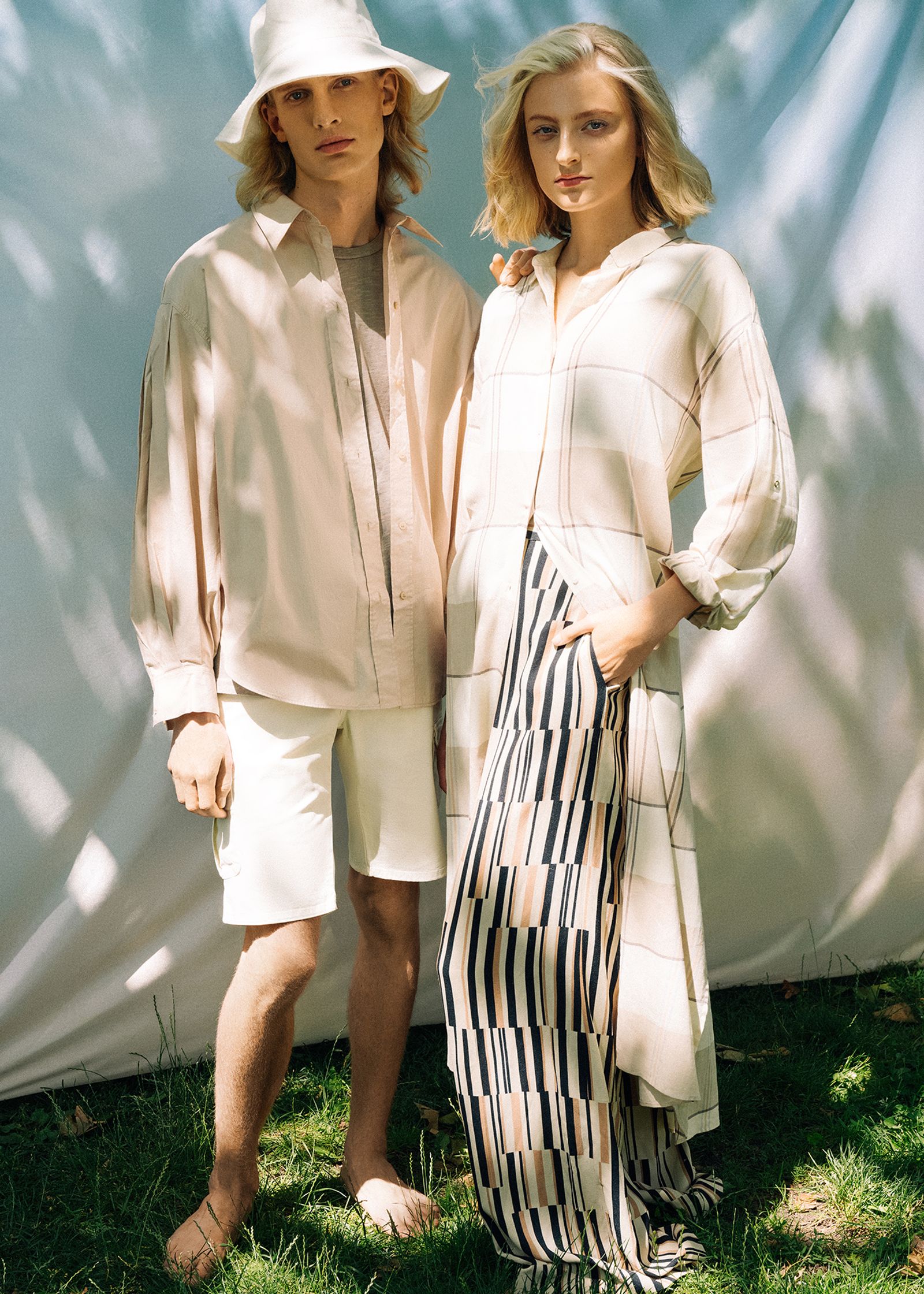 a man and a woman standing next to each other