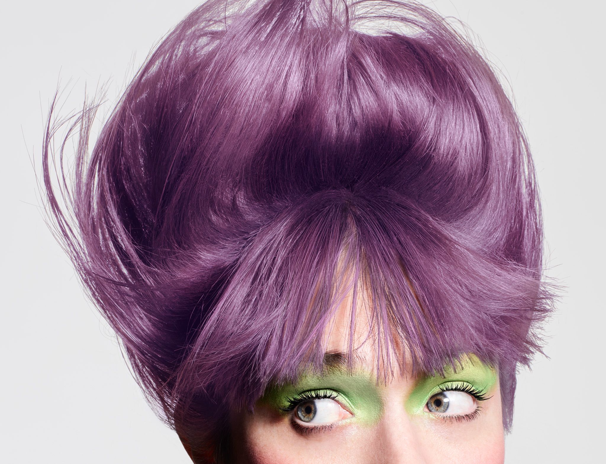 Eye makeup shifted to pastel green to match the new hair color
